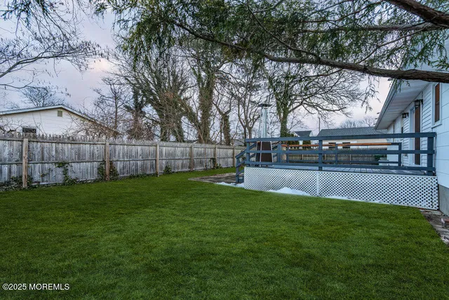a view of a park with large trees