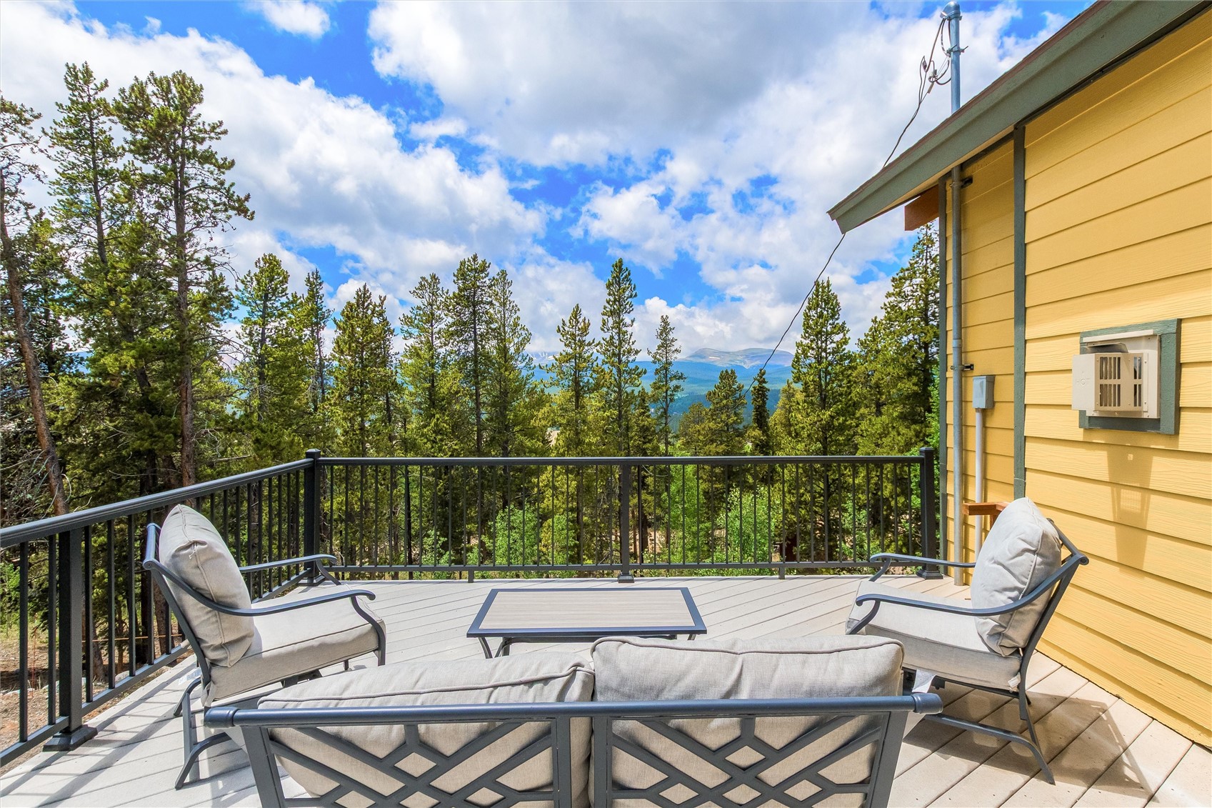 592 Ponderosa Road Fairplay, CO 80440 - Photo 5 of 45 a view of a chairs and table in the balcony