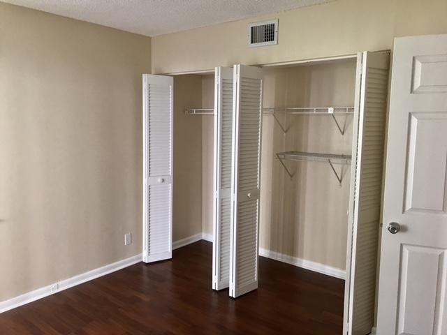 5321 Buckhead Circle Boca Raton, FL 33431 - Photo 21 of 35 a view of empty room with wooden floor