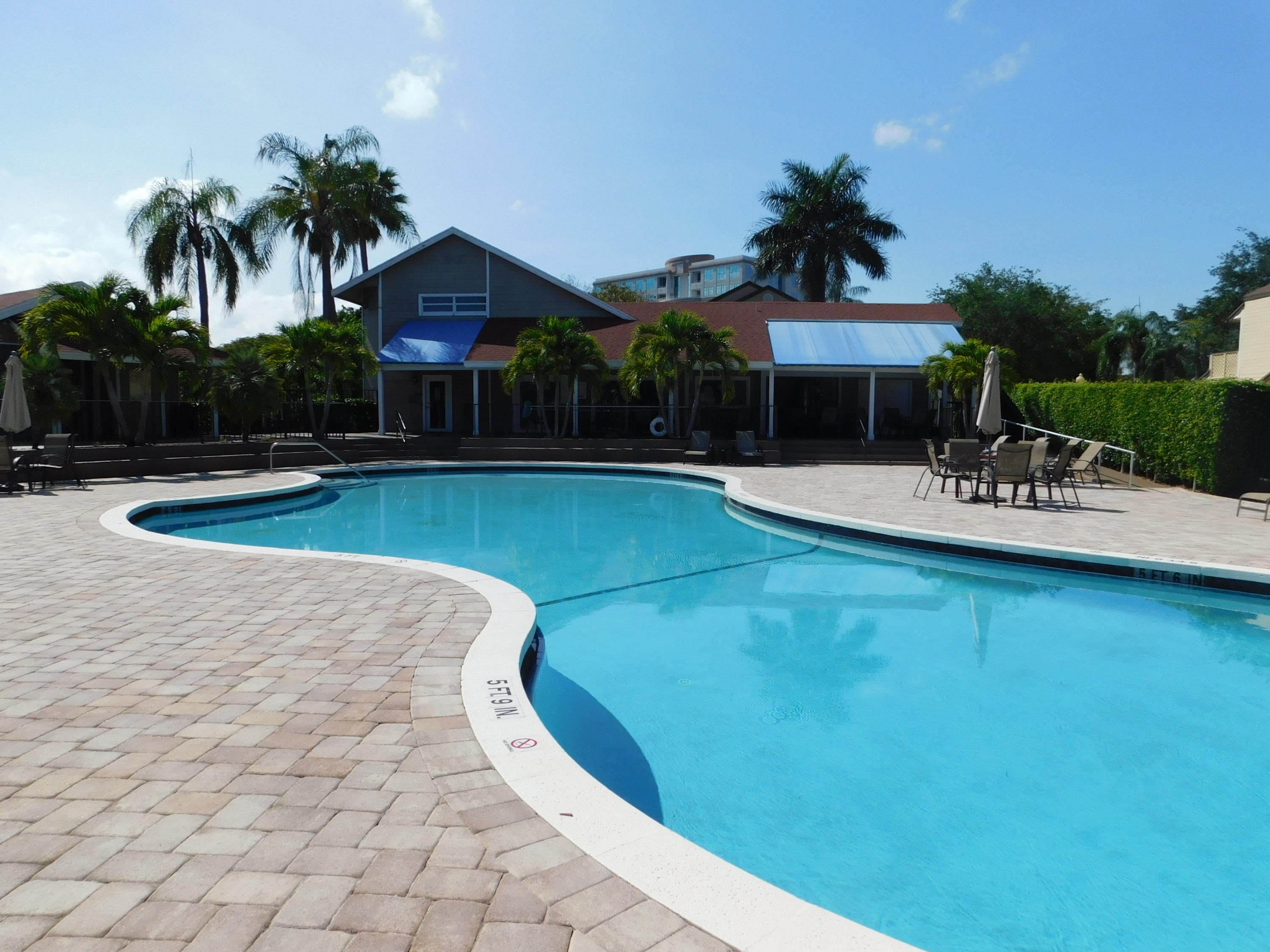 5321 Buckhead Circle Boca Raton, FL 33431 - Photo 24 of 35 a view of a house with swimming pool and sitting area