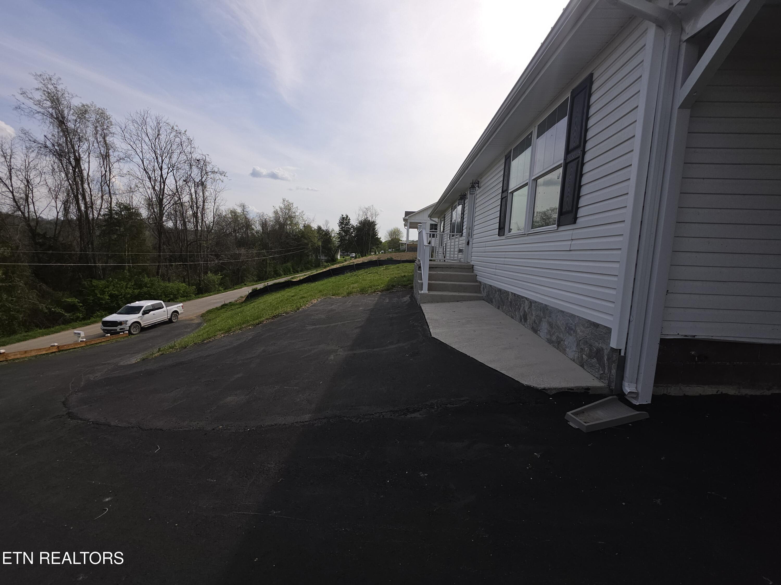 330 Wilson Hurst Street Tazewell, TN 37879 - Photo 2 of 26 20260403_163621