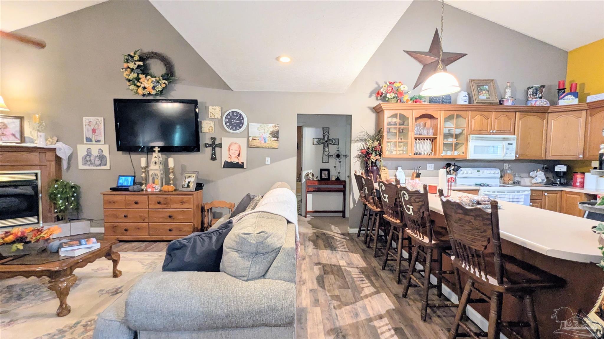 3171 Sam Sullivan Road Millry, AL 36558 - Photo 13 of 72 a living room with furniture and a flat screen tv