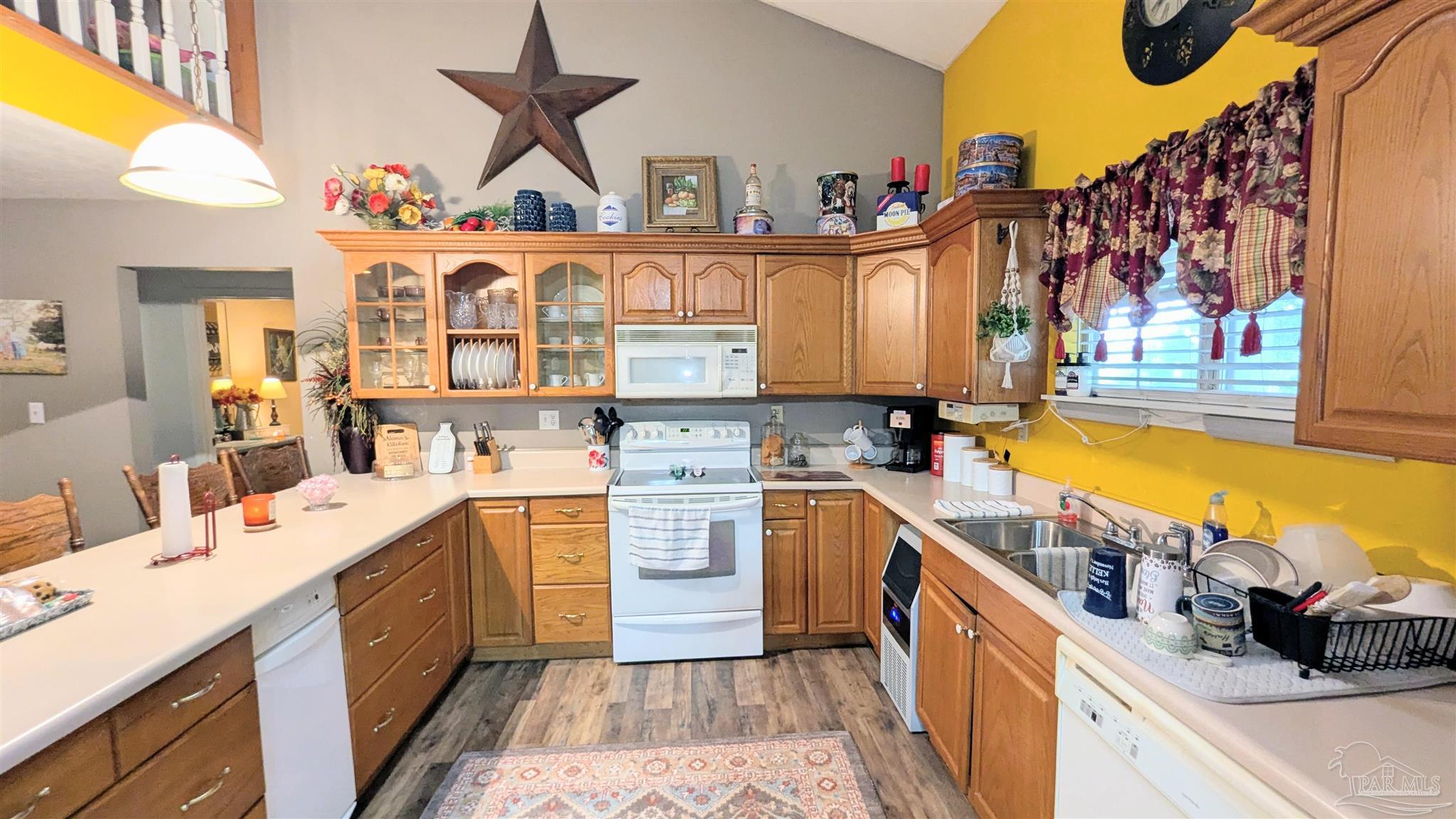 3171 Sam Sullivan Road Millry, AL 36558 - Photo 21 of 72 a kitchen with a sink and a stove top oven