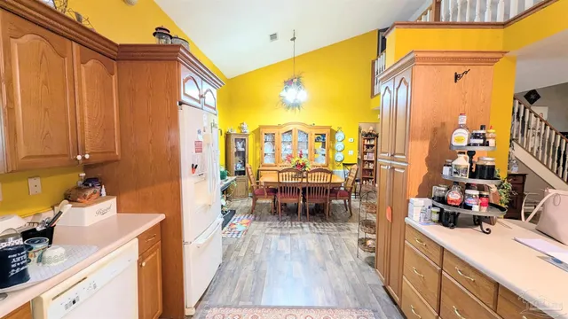 a bedroom with furniture and a gym equipment