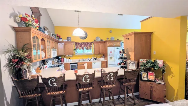 a spacious bathroom with a double vanity sink and a mirror