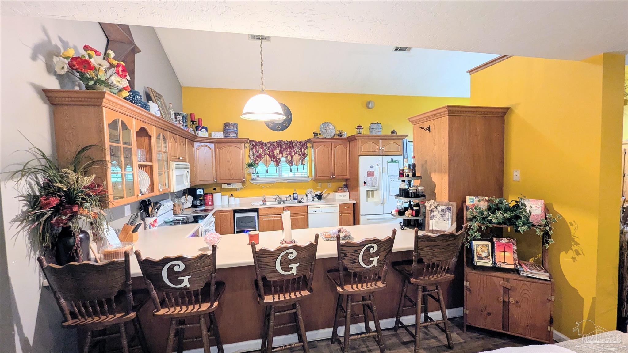 3171 Sam Sullivan Road Millry, AL 36558 - Photo 27 of 72 a outdoor dining space with furniture and a potted plant