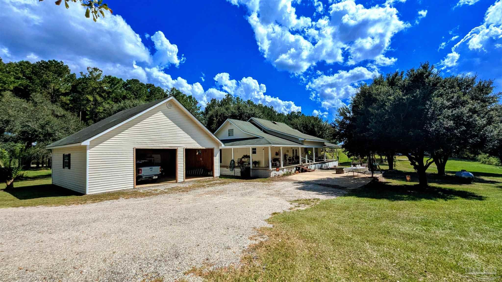 3171 Sam Sullivan Road Millry, AL 36558 - Photo 50 of 72 a view of a house with a yard