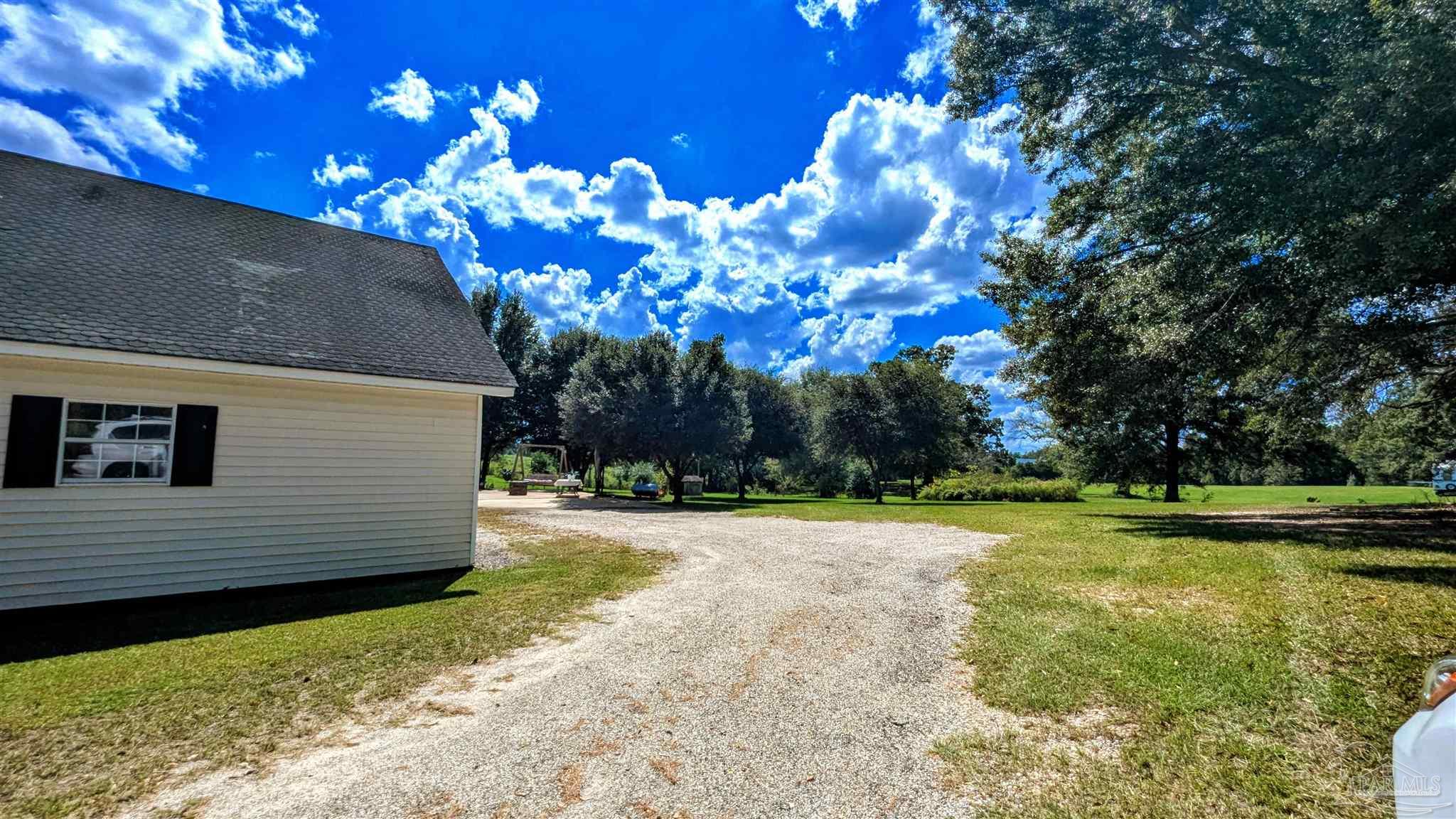 3171 Sam Sullivan Road Millry, AL 36558 - Photo 57 of 72 a view of a backyard