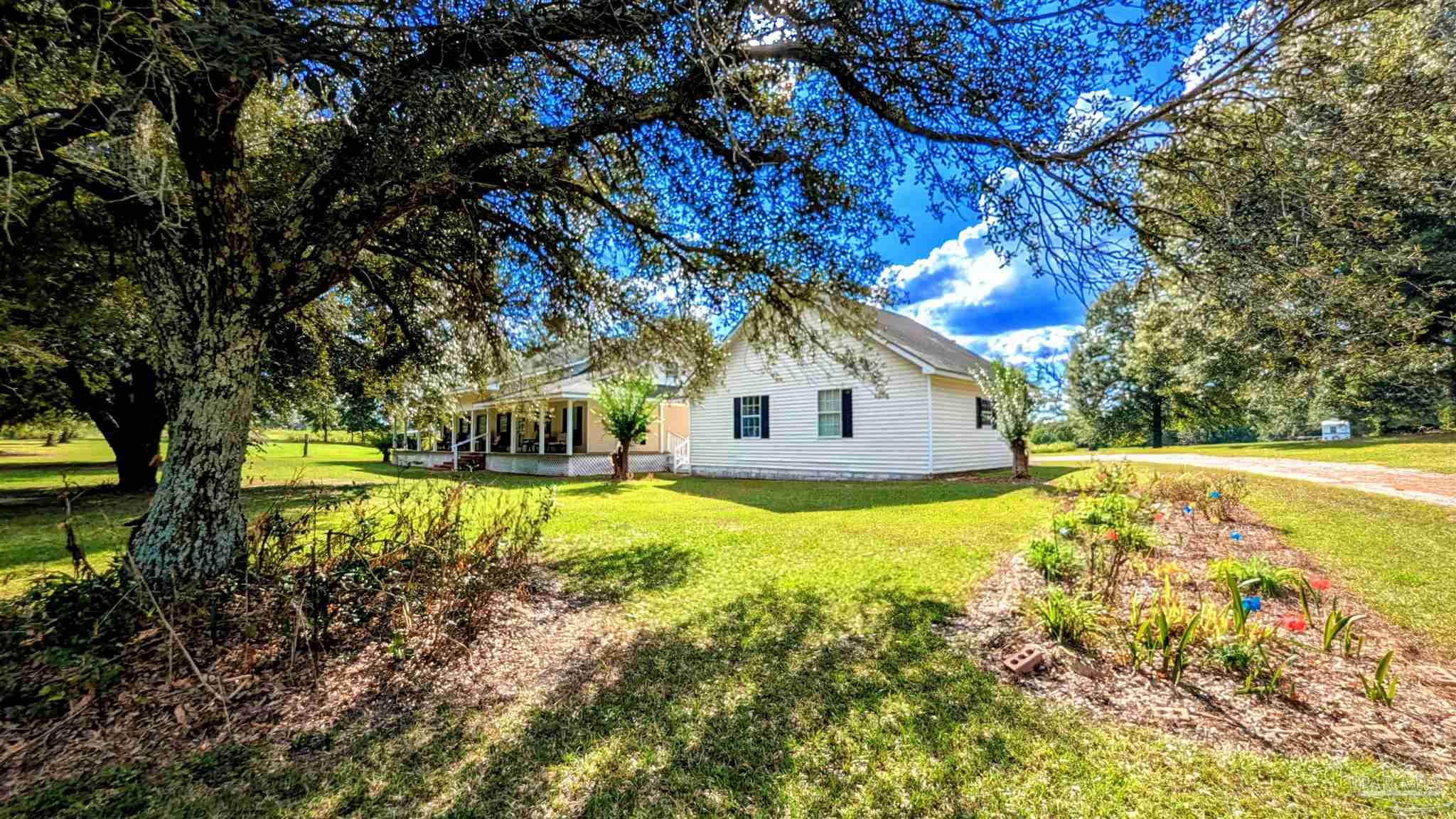3171 Sam Sullivan Road Millry, AL 36558 - Photo 67 of 72 a view of a house with a yard