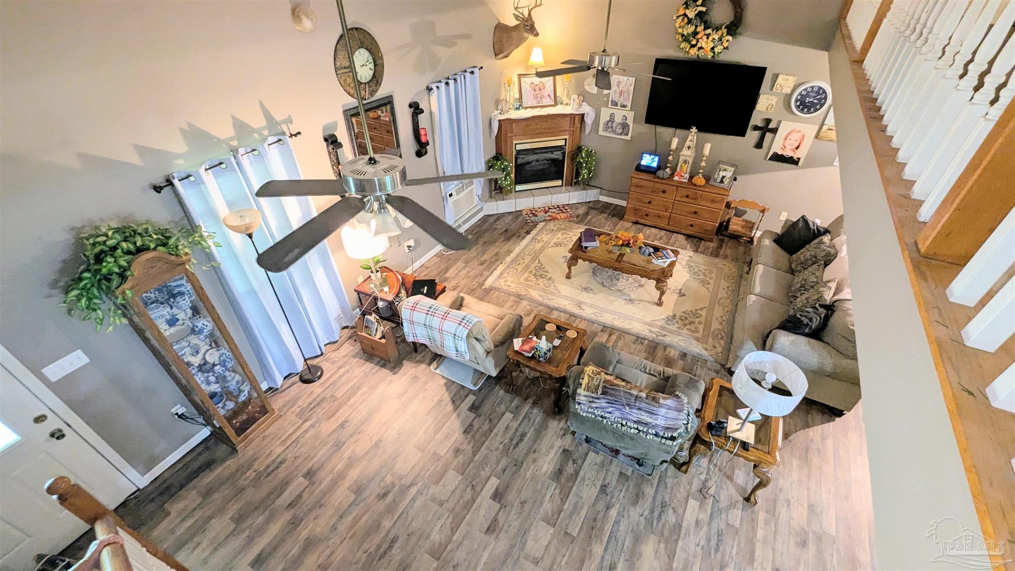 3171 Sam Sullivan Road Millry, AL 36558 - Photo 8 of 72 a living room with furniture and a flat screen tv