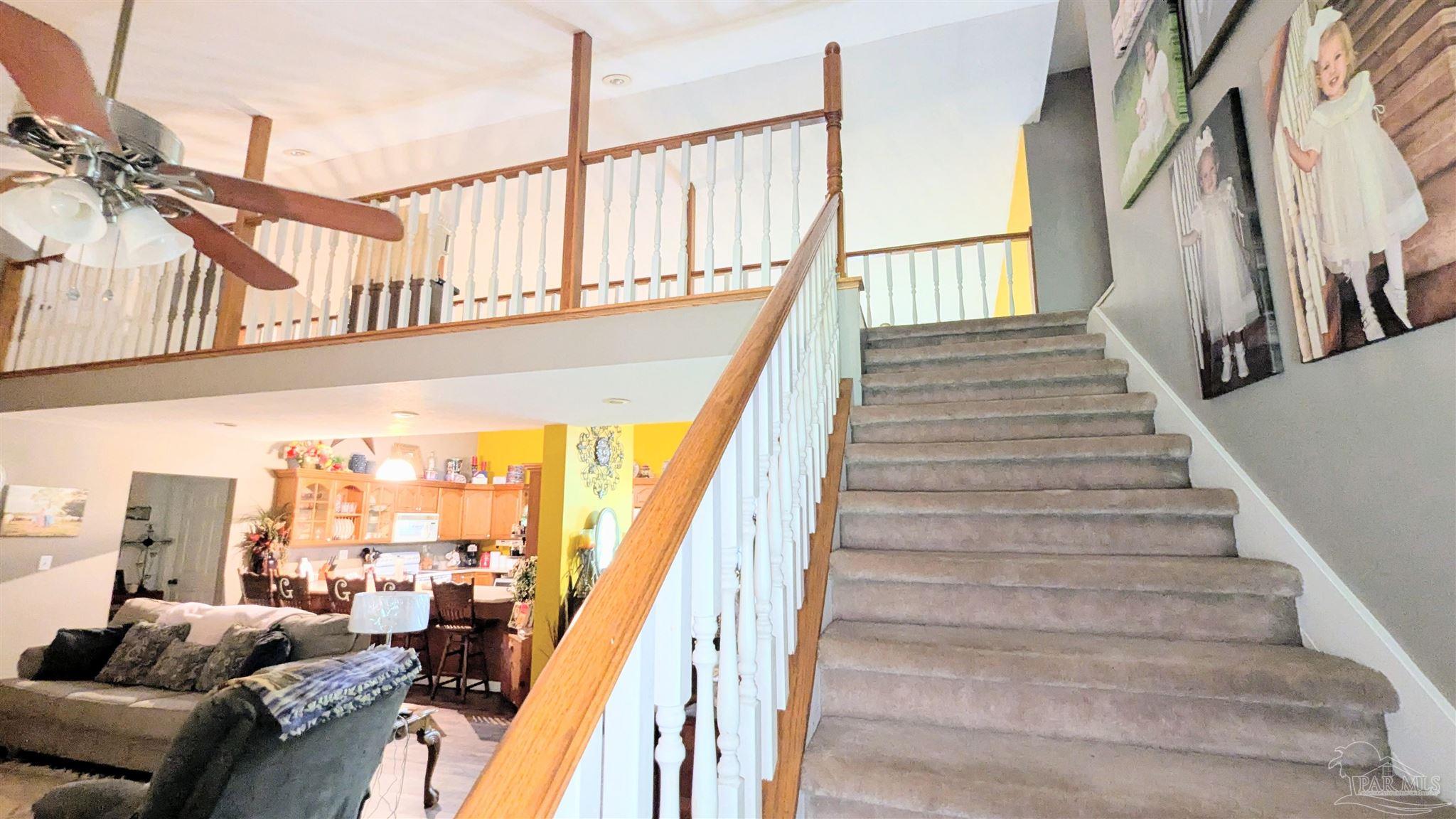 3171 Sam Sullivan Road Millry, AL 36558 - Photo 9 of 72 a view of entryway and hall with wooden floor
