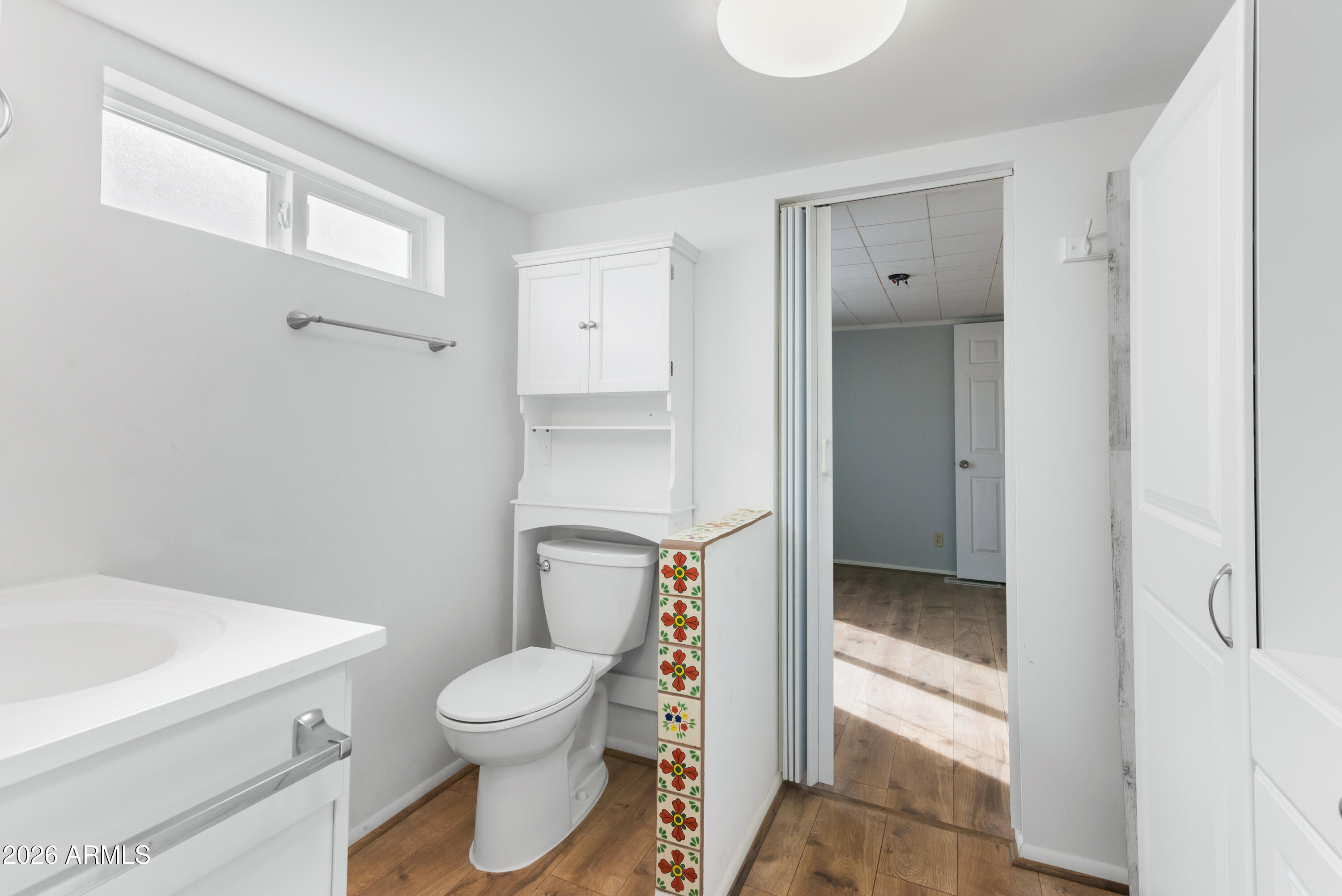 151 South Amulet Avenue Mesa, AZ 85208 - Photo 18 of 29 a bathroom with a toilet and a shower