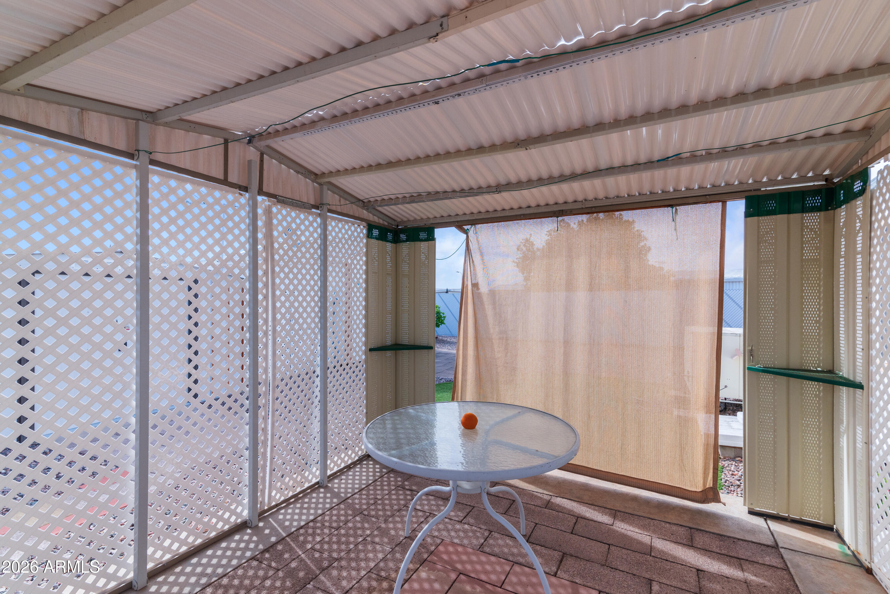 151 South Amulet Avenue Mesa, AZ 85208 - Photo 27 of 29 a view of a room that has a bed and a chandelier