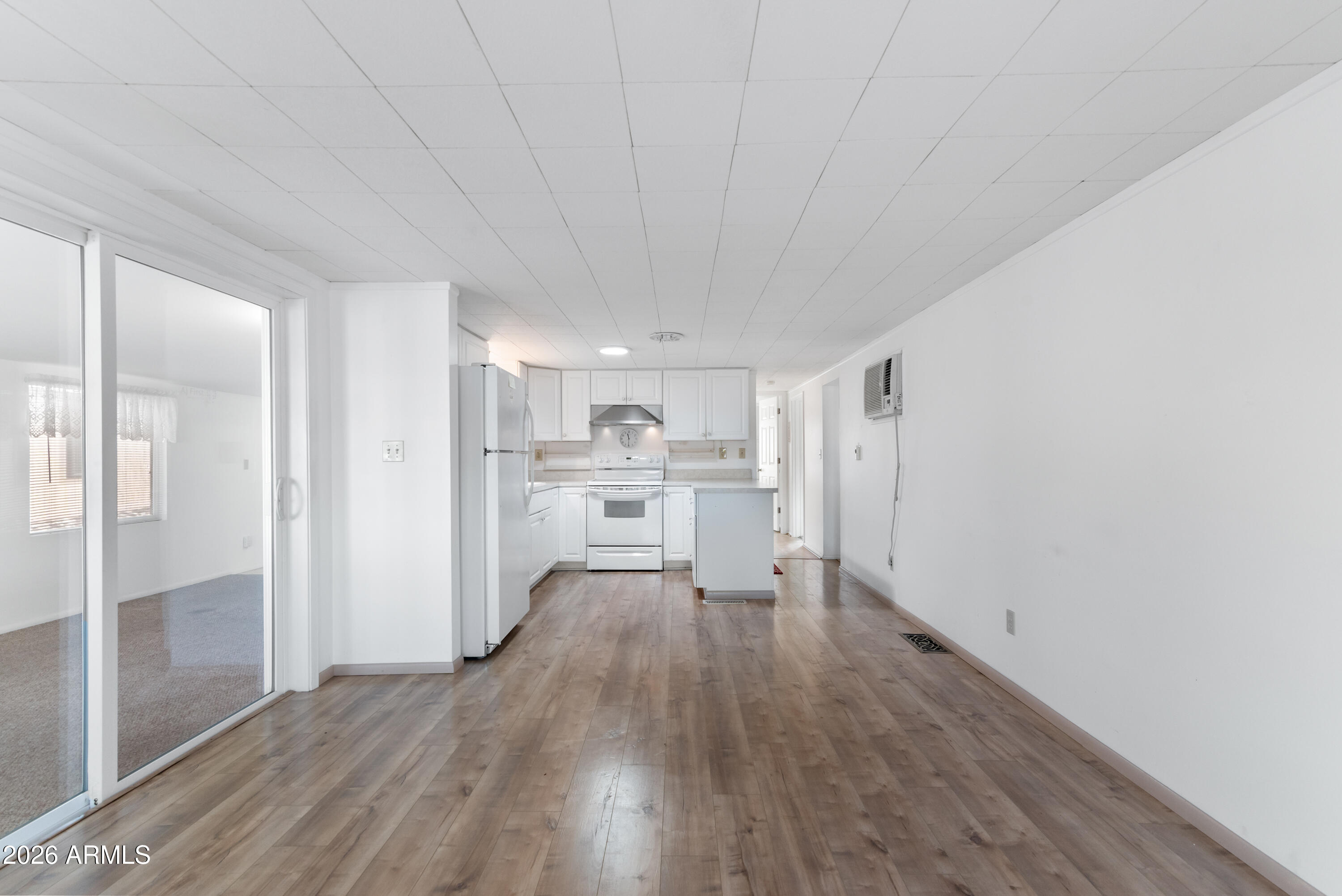 151 South Amulet Avenue Mesa, AZ 85208 - Photo 6 of 29 a view of a kitchen with wooden floor