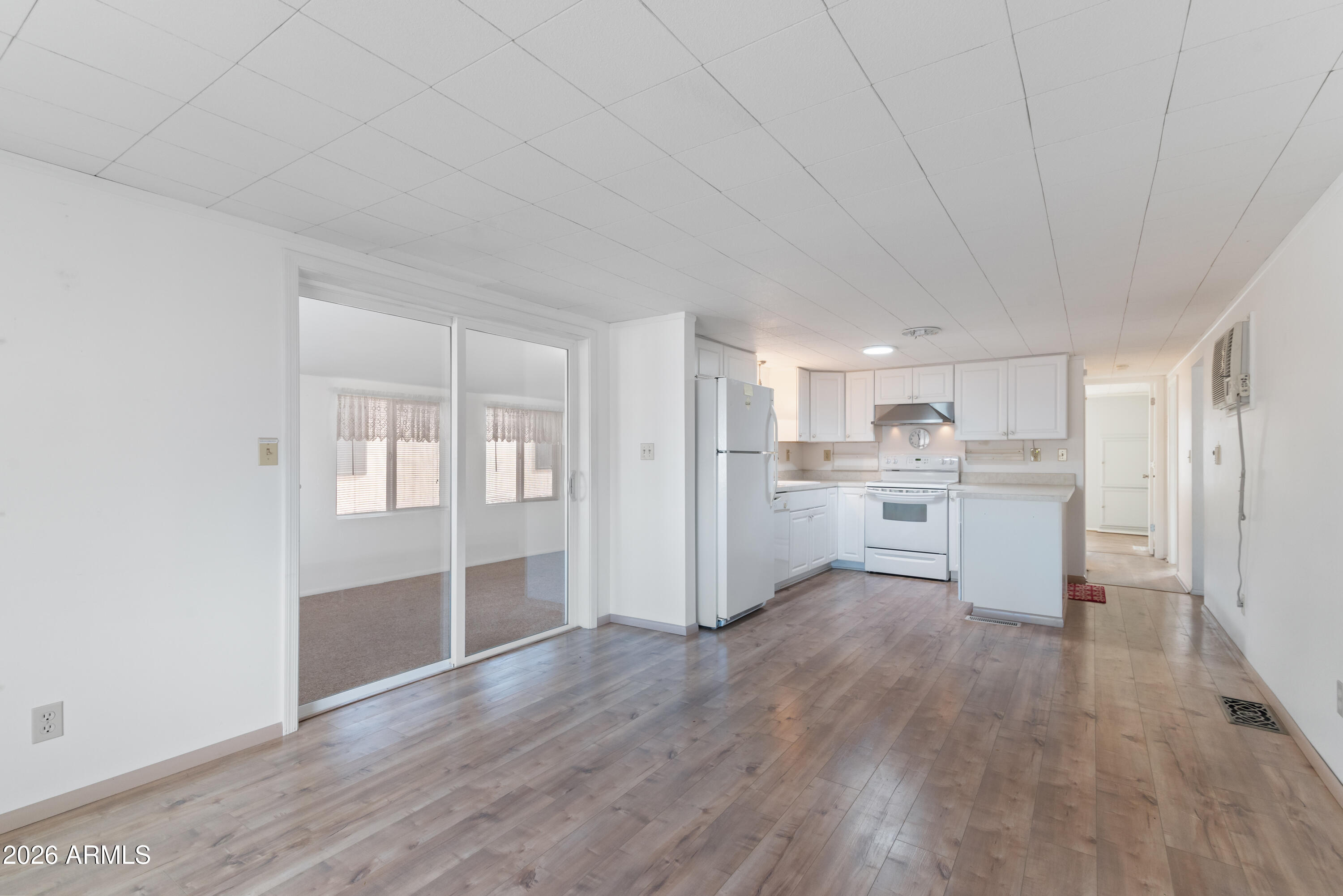 151 South Amulet Avenue Mesa, AZ 85208 - Photo 7 of 29 a view of a kitchen with wooden floor