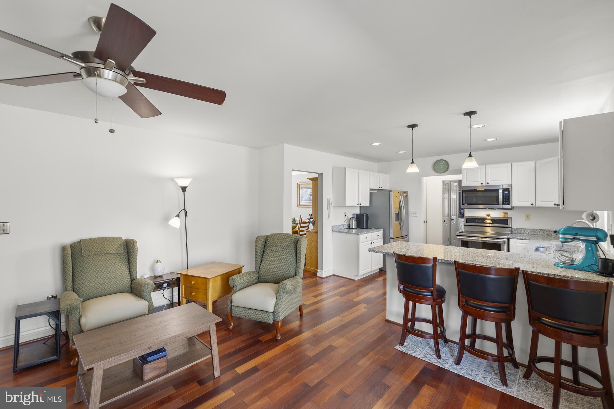 2300 Pin Oak Drive Finksburg, MD 21048 - Photo 12 of 52 a living room with furniture and a view of kitchen