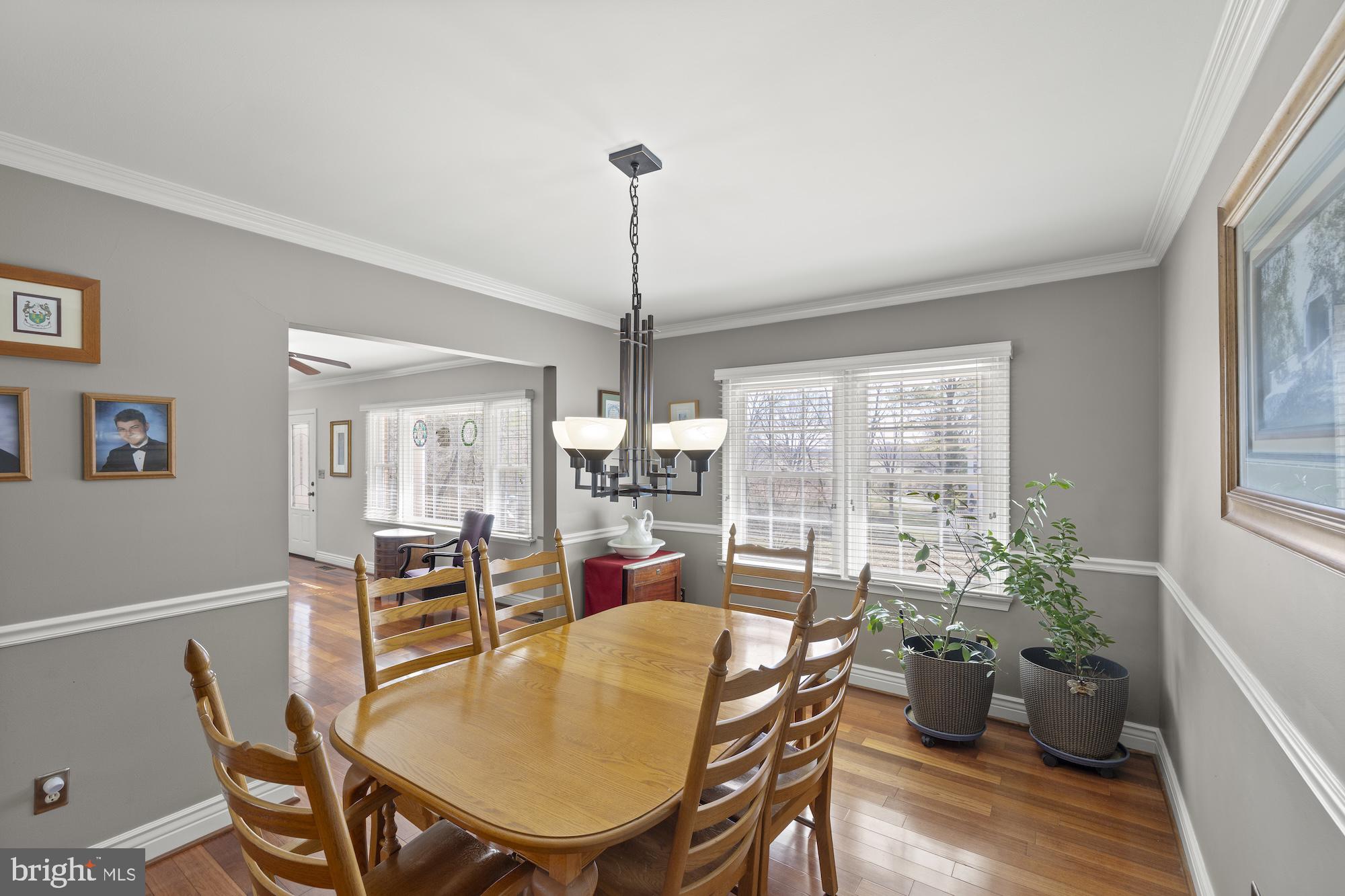 2300 Pin Oak Drive Finksburg, MD 21048 - Photo 17 of 52 a dining room with furniture window wooden floor