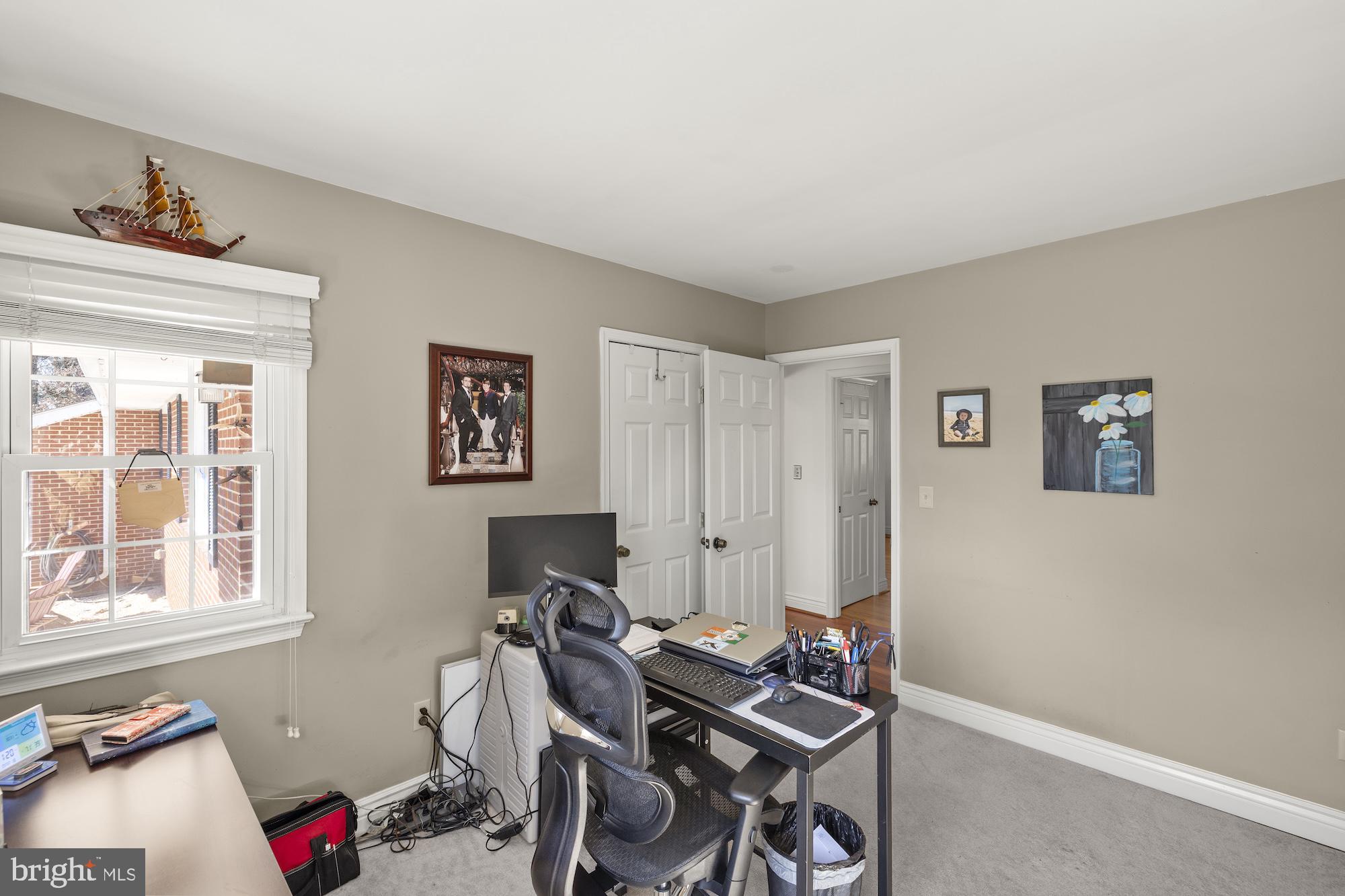 2300 Pin Oak Drive Finksburg, MD 21048 - Photo 22 of 52 a view of a workspace with furniture and a window
