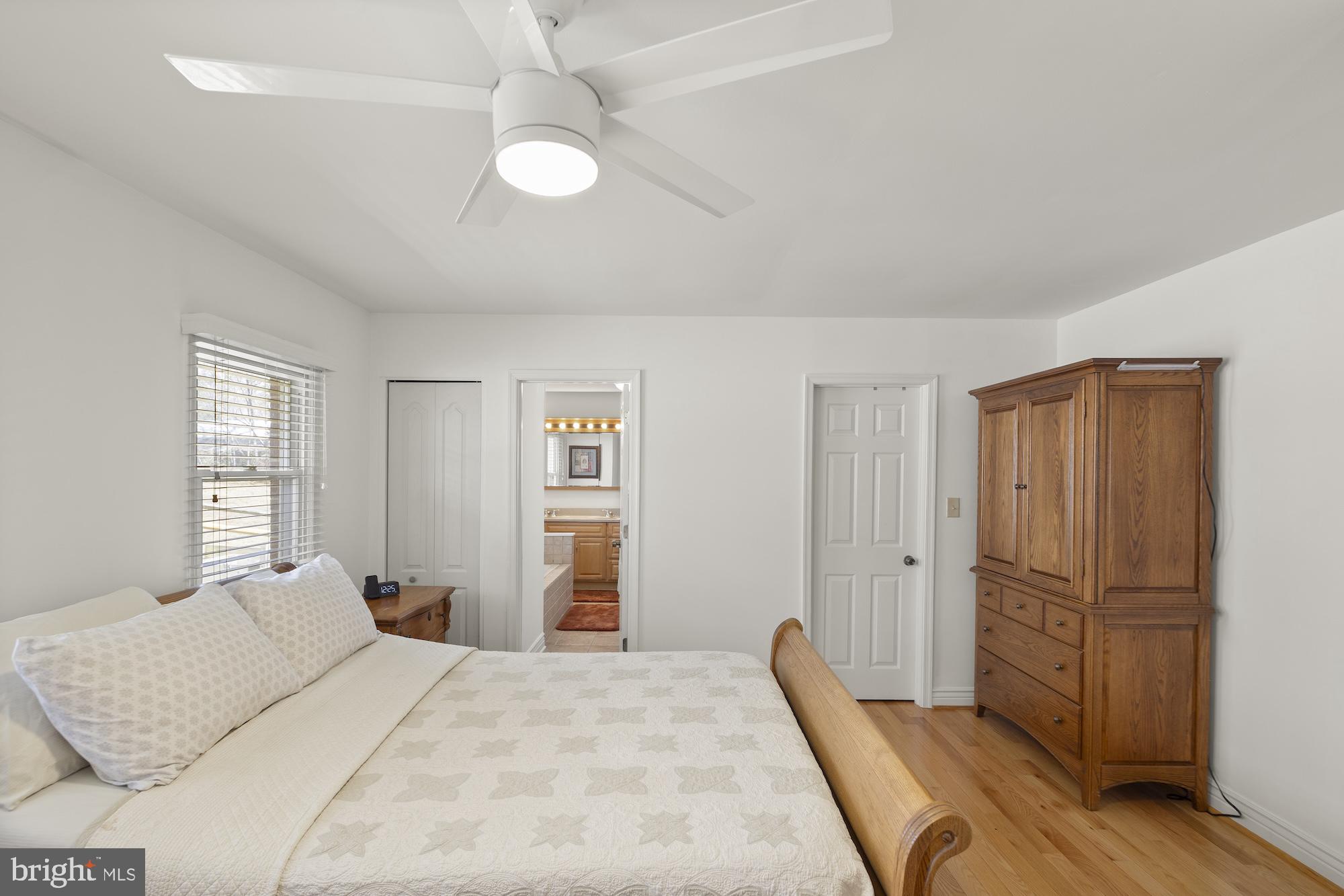 2300 Pin Oak Drive Finksburg, MD 21048 - Photo 25 of 52 a bedroom with a bed and a dresser