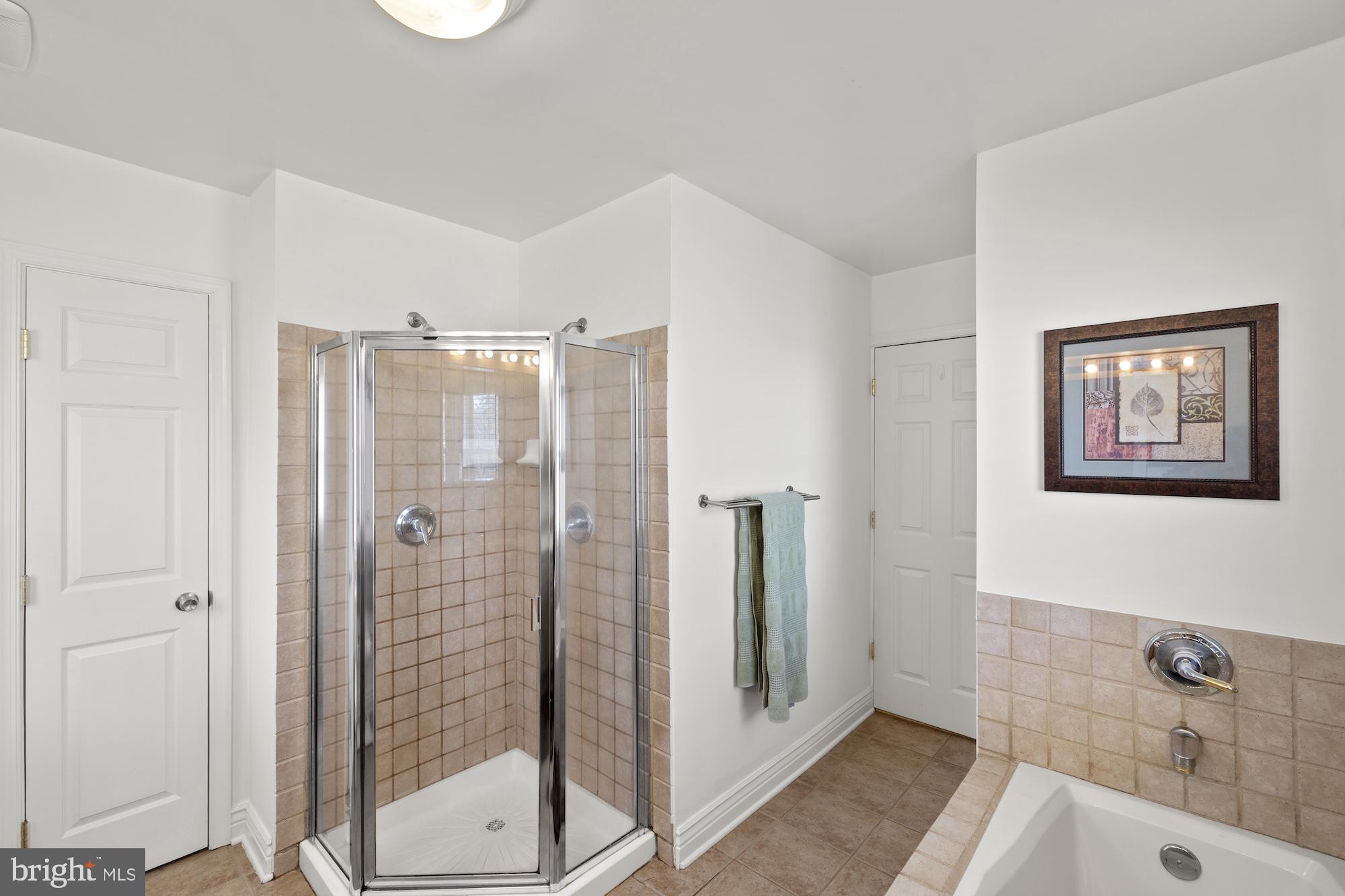 2300 Pin Oak Drive Finksburg, MD 21048 - Photo 28 of 52 a bathroom with a shower and a sink