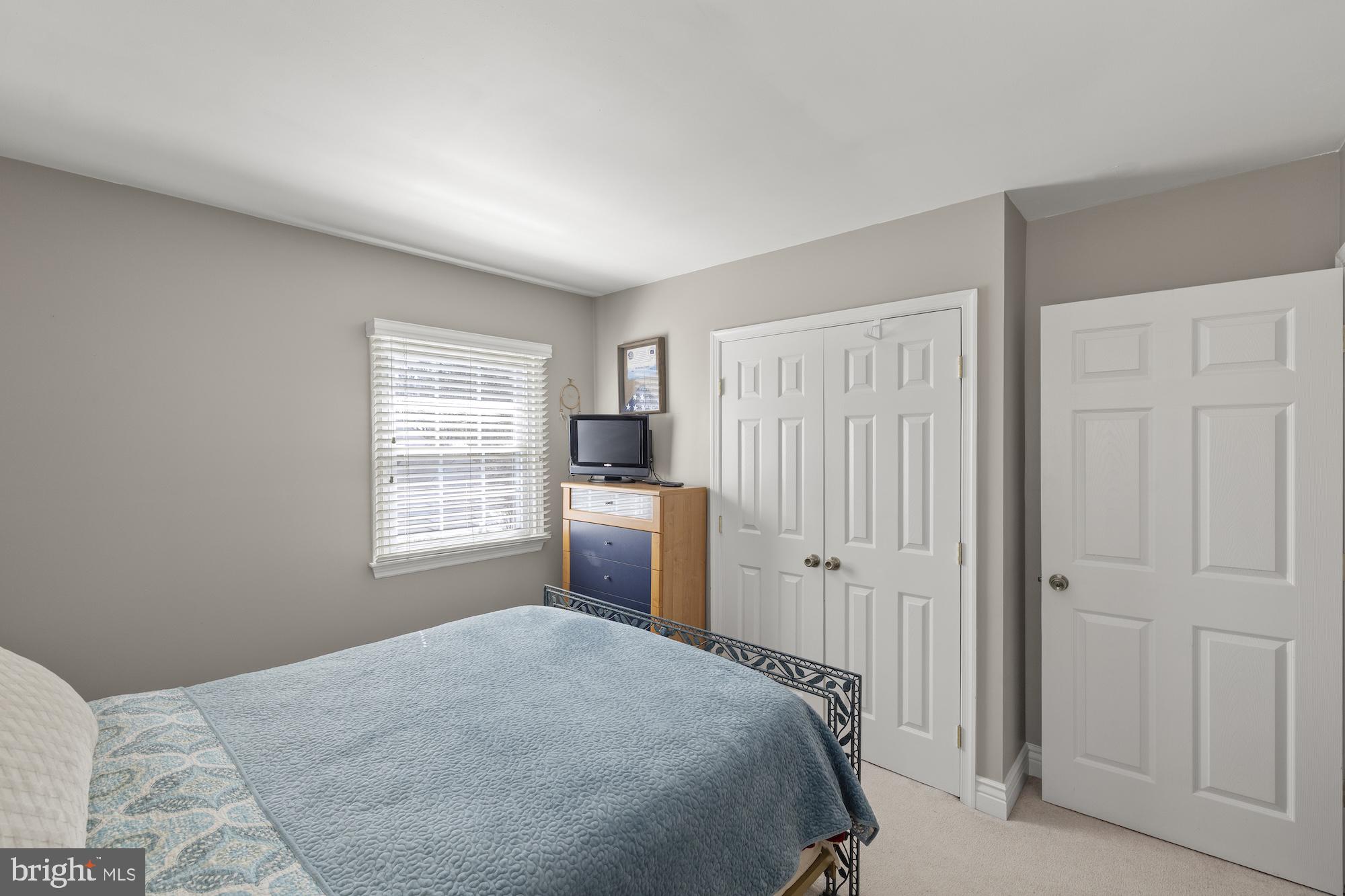 2300 Pin Oak Drive Finksburg, MD 21048 - Photo 31 of 52 a bedroom with a bed and a window