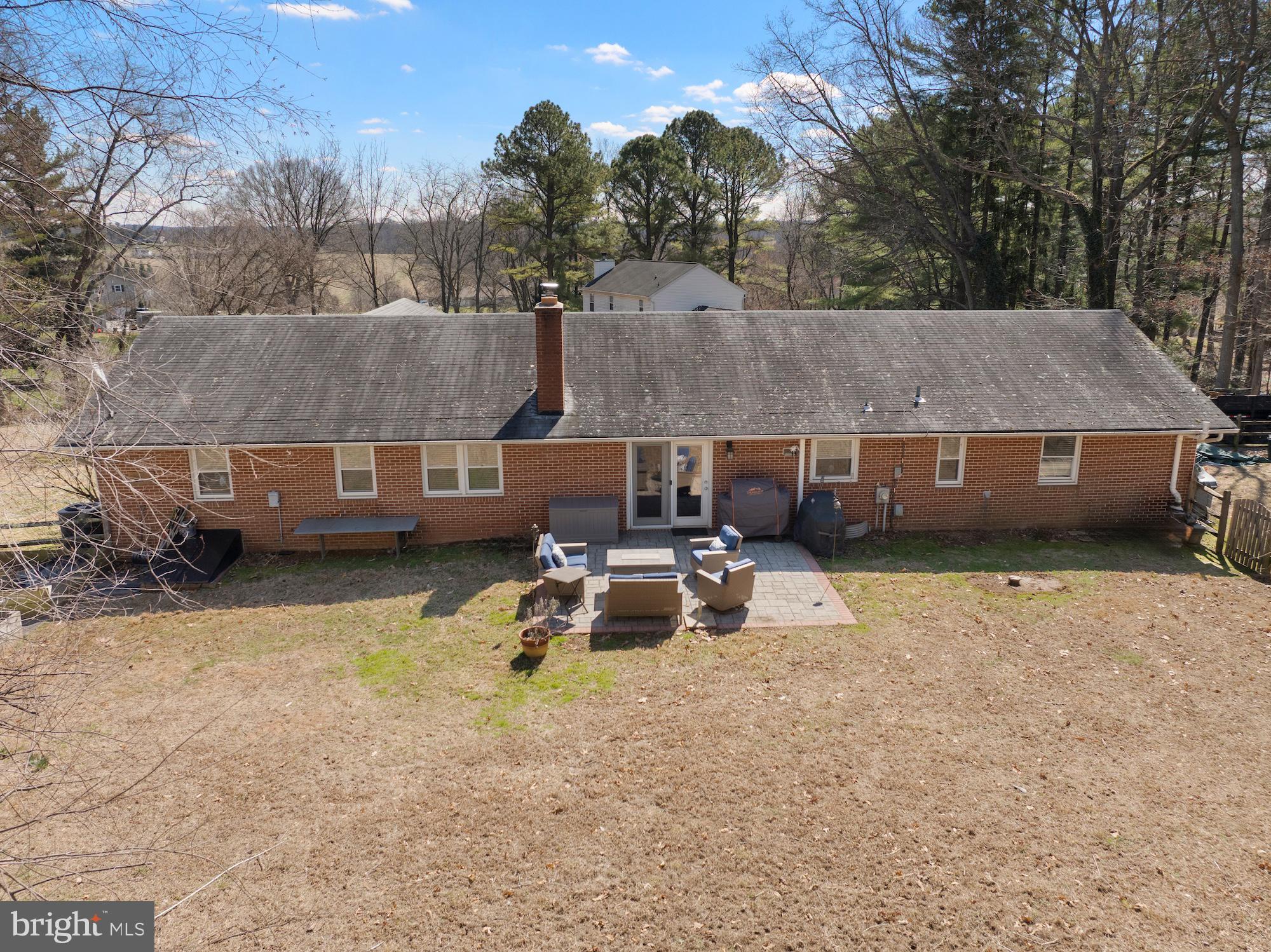 2300 Pin Oak Drive Finksburg, MD 21048 - Photo 38 of 52 a view of a back yard with a patio