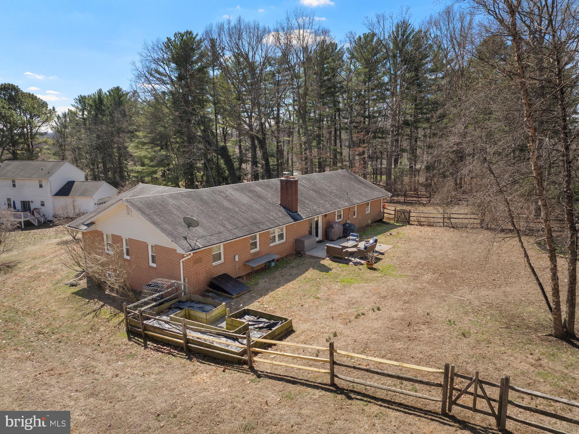 2300 Pin Oak Drive Finksburg, MD 21048 - Photo 45 of 52 a view of a house with a yard