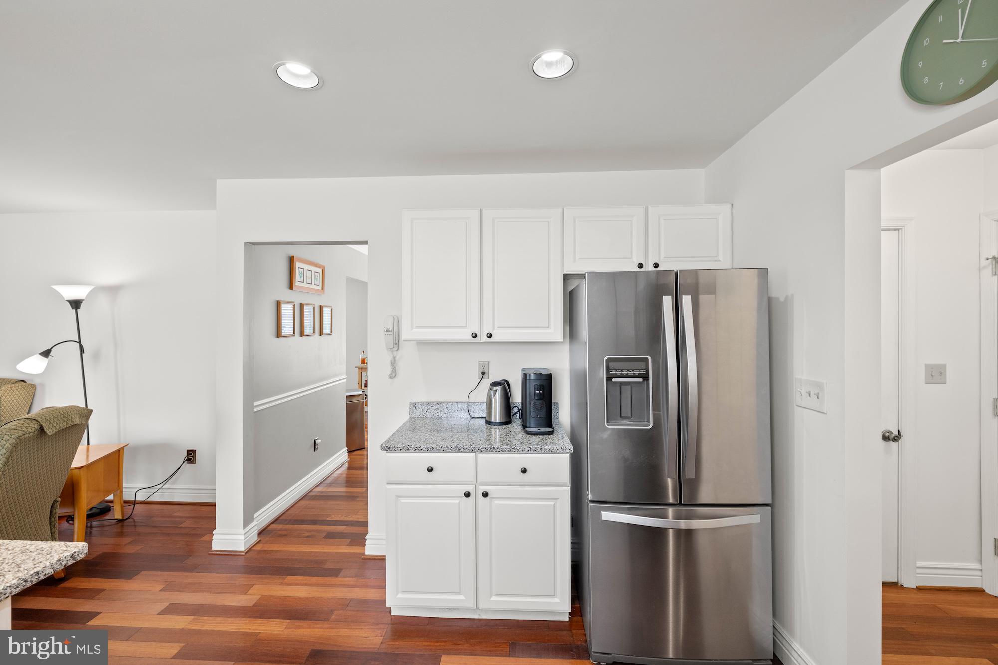2300 Pin Oak Drive Finksburg, MD 21048 - Photo 7 of 52 a kitchen with stainless steel appliances a refrigerator sink and cabinets