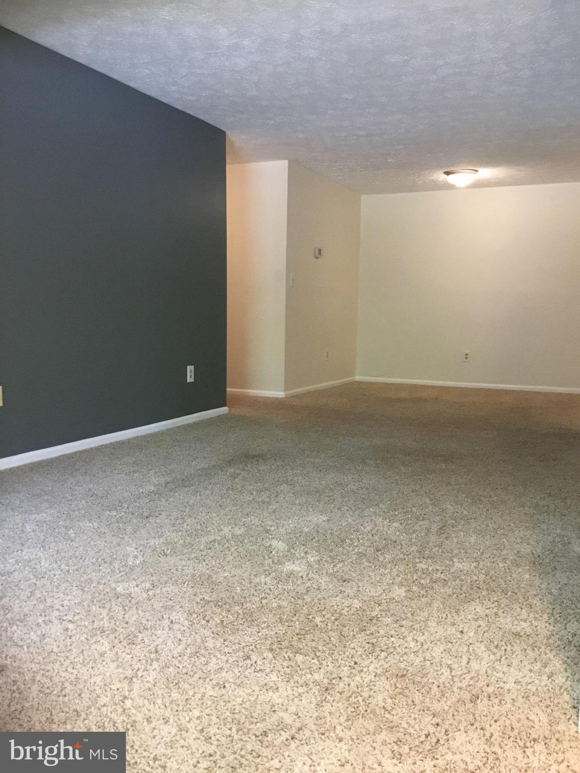 2215 Hunter's Run Drive, Unit 2215 Reston, VA 20191 - Photo 11 of 26 Dining Room & Living Room
