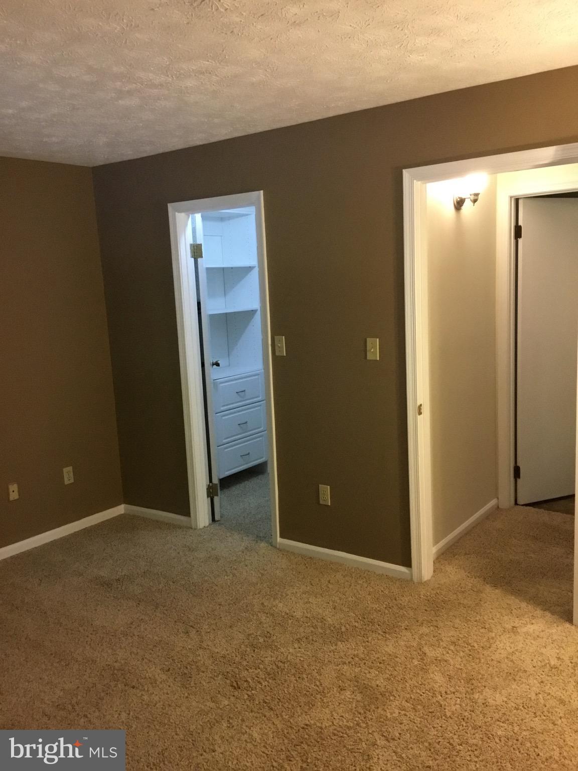2215 Hunter's Run Drive, Unit 2215 Reston, VA 20191 - Photo 17 of 26 Large Bedroom
