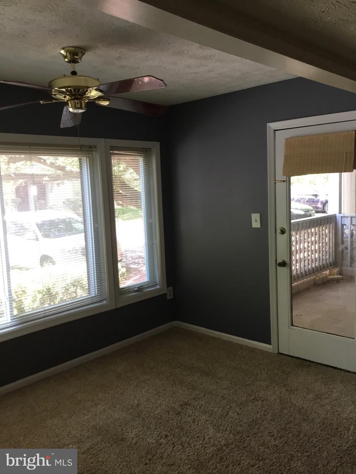 2215 Hunter's Run Drive, Unit 2215 Reston, VA 20191 - Photo 8 of 26 Separate Sun Room connecting to Balcony