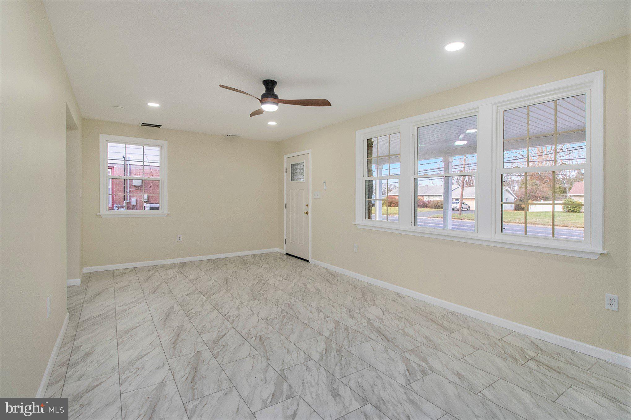 711 West County Line Road Hatboro, PA 19040 - Photo 11 of 40 a view of an empty room with a window
