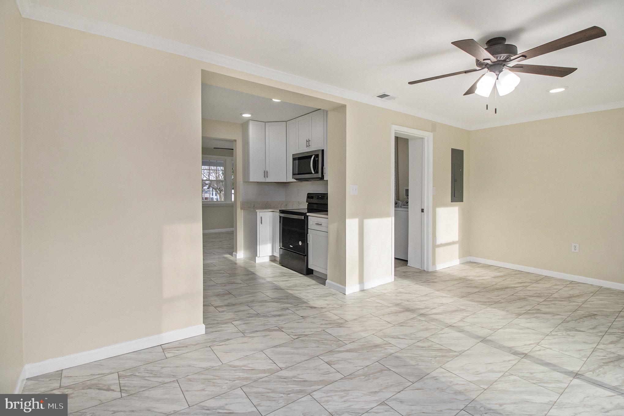 711 West County Line Road Hatboro, PA 19040 - Photo 19 of 40 a view of a livingroom with a kitchen
