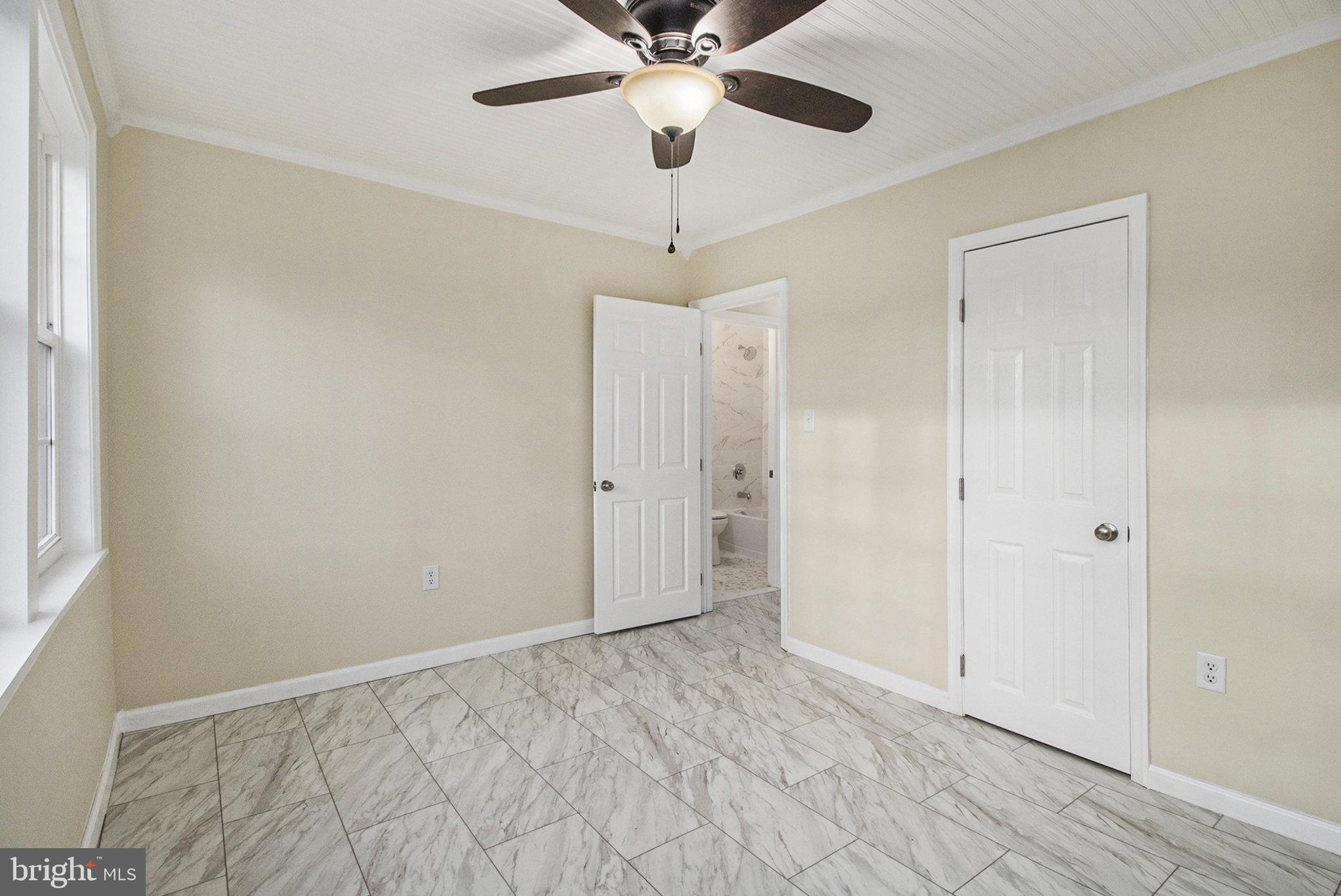 711 West County Line Road Hatboro, PA 19040 - Photo 30 of 40 a view of an empty room and chandelier fan