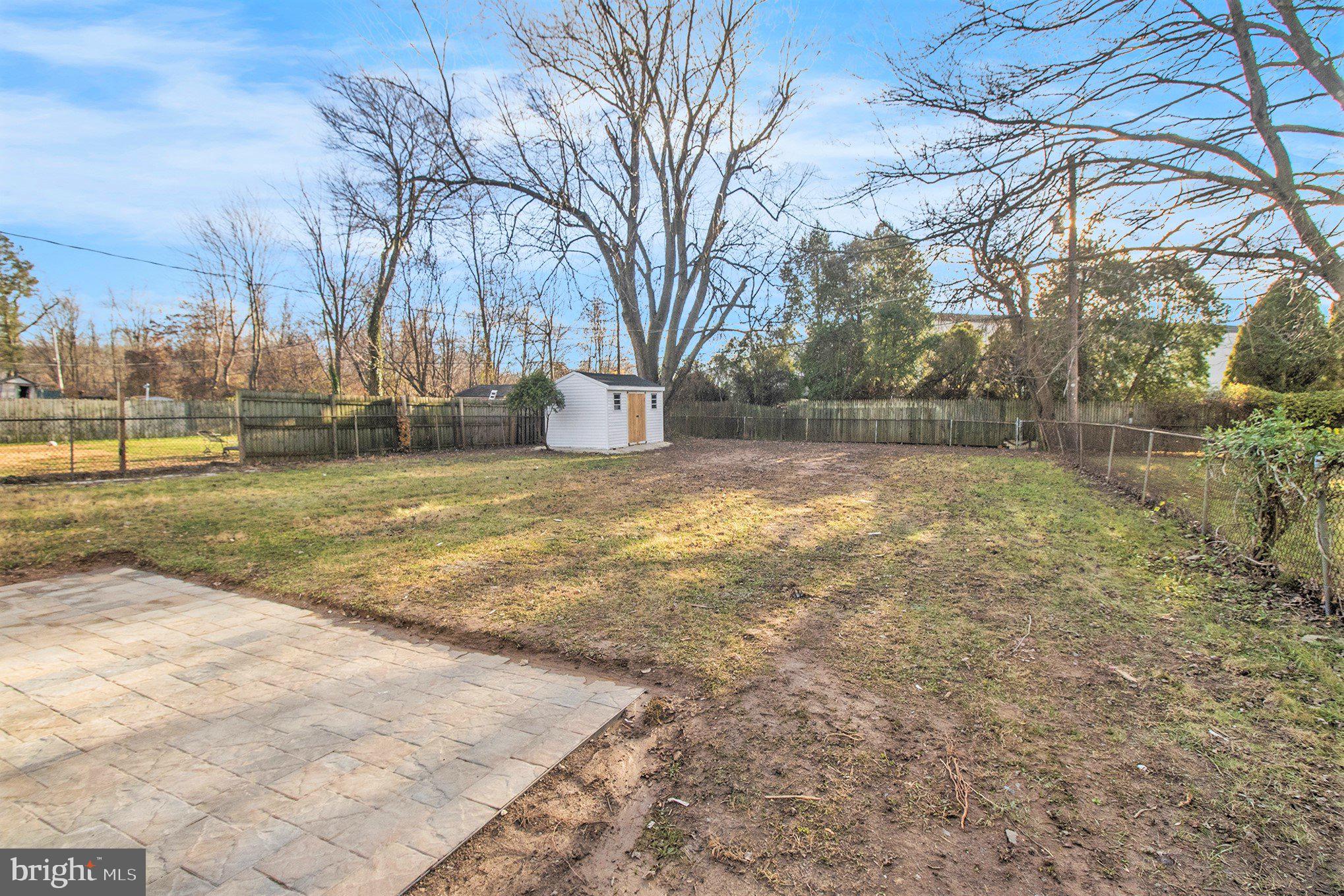711 West County Line Road Hatboro, PA 19040 - Photo 35 of 40 a view of a yard with a tree