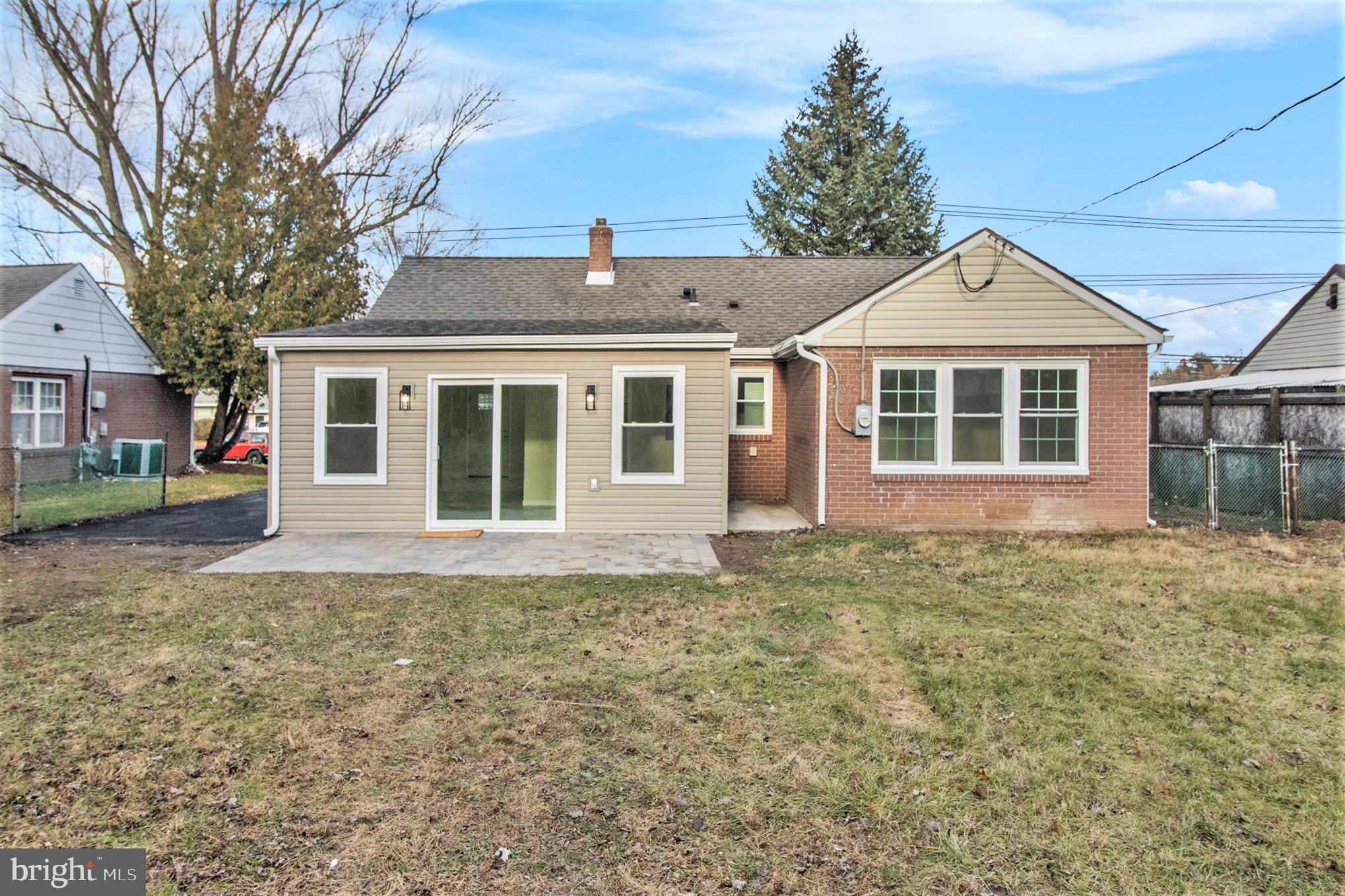 711 West County Line Road Hatboro, PA 19040 - Photo 38 of 40 a view of a house with a yard