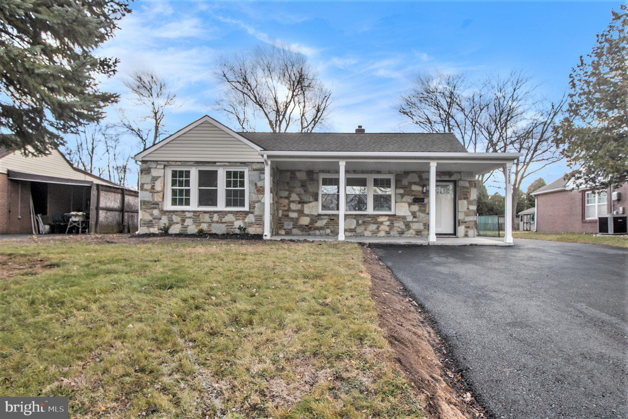 711 West County Line Road Hatboro, PA 19040 - Photo 5 of 40 front view of a house with a yard
