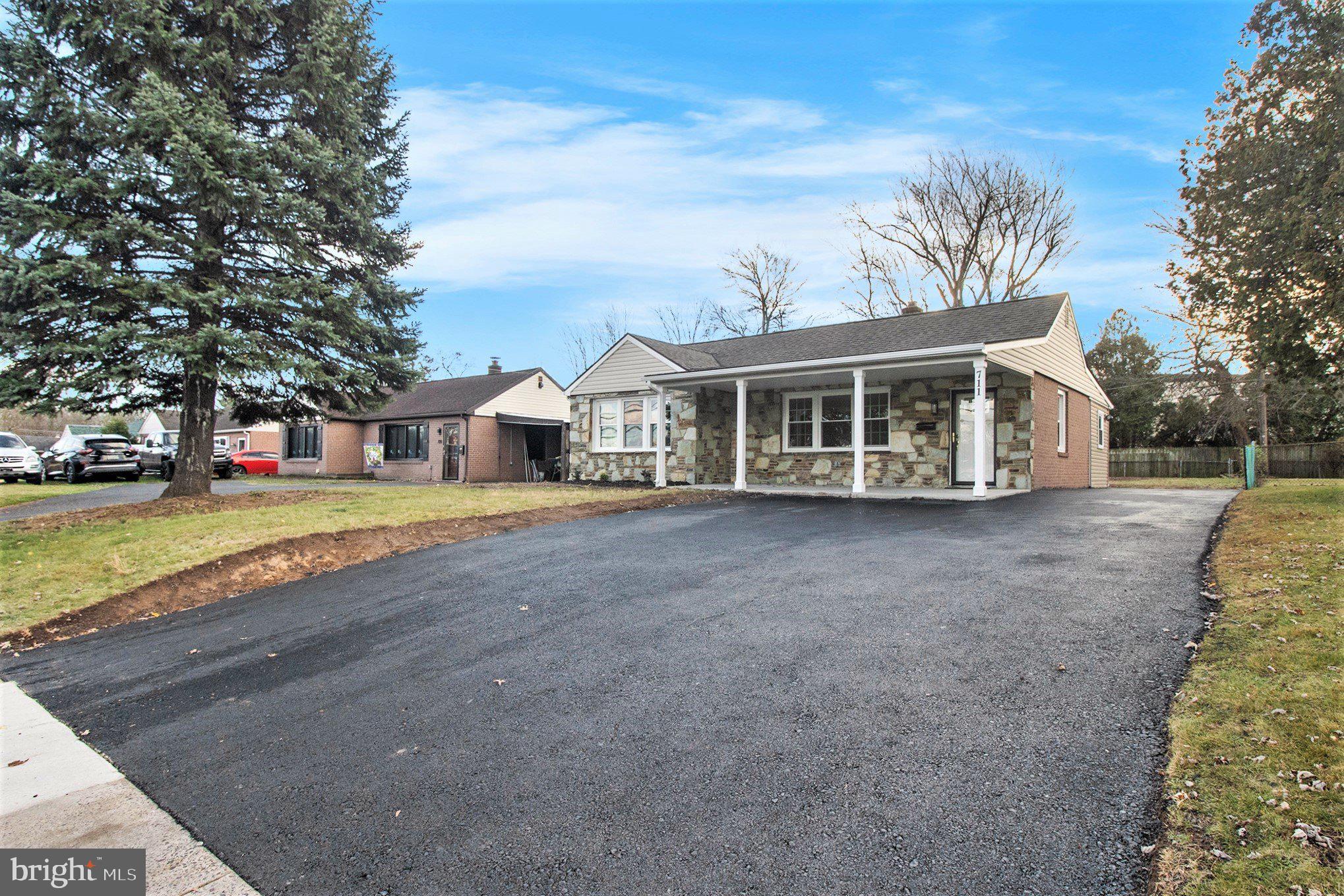 711 West County Line Road Hatboro, PA 19040 - Photo 6 of 40 a view of a house with a yard