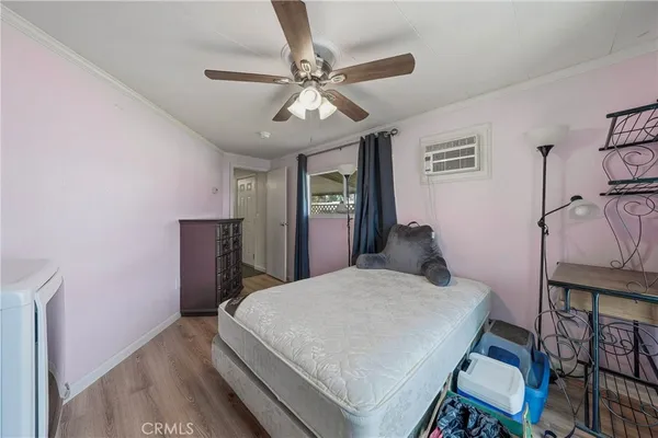 a bathroom with a sink mirror and vanity