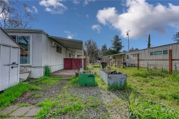 a backyard of a house with seating space
