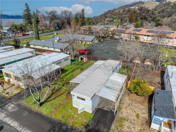 an aerial view of a houses with outdoor space