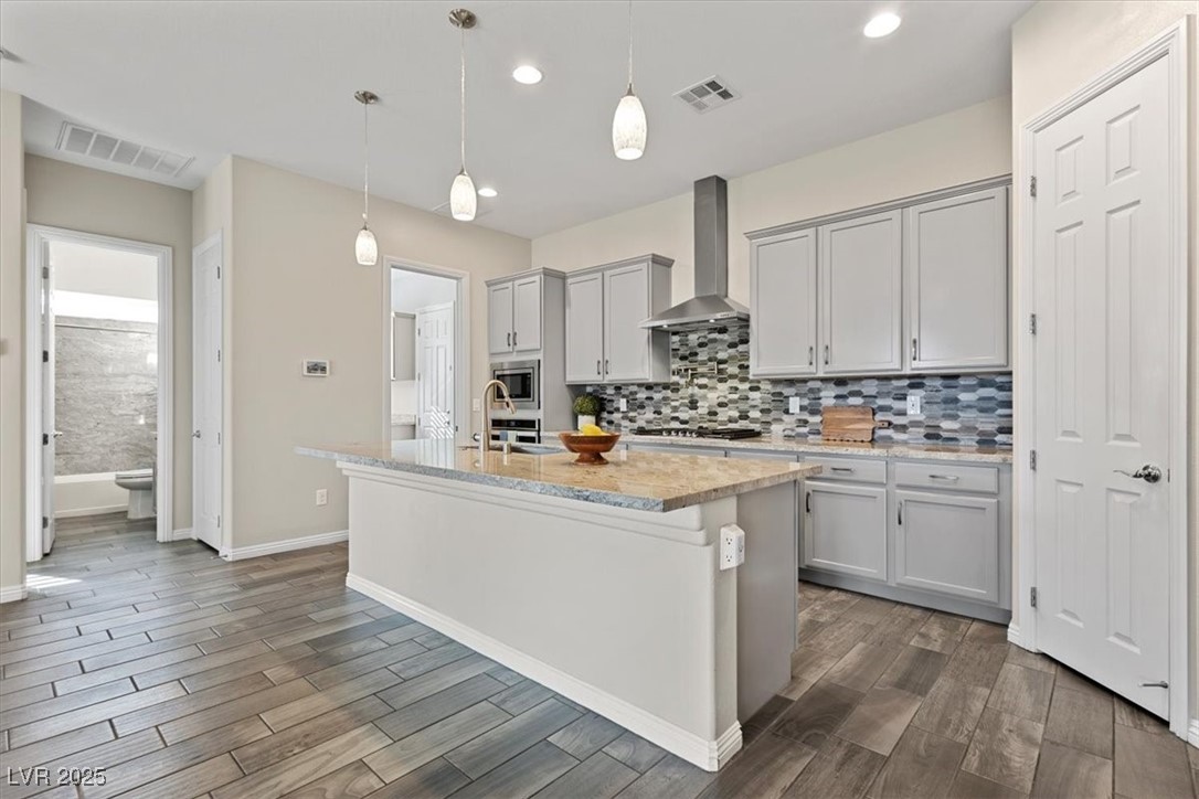 7072 Arabian Ridge Street Las Vegas, NV 89131 - Photo 12 of 30 Bedroom 2 and bathroom off kitchen