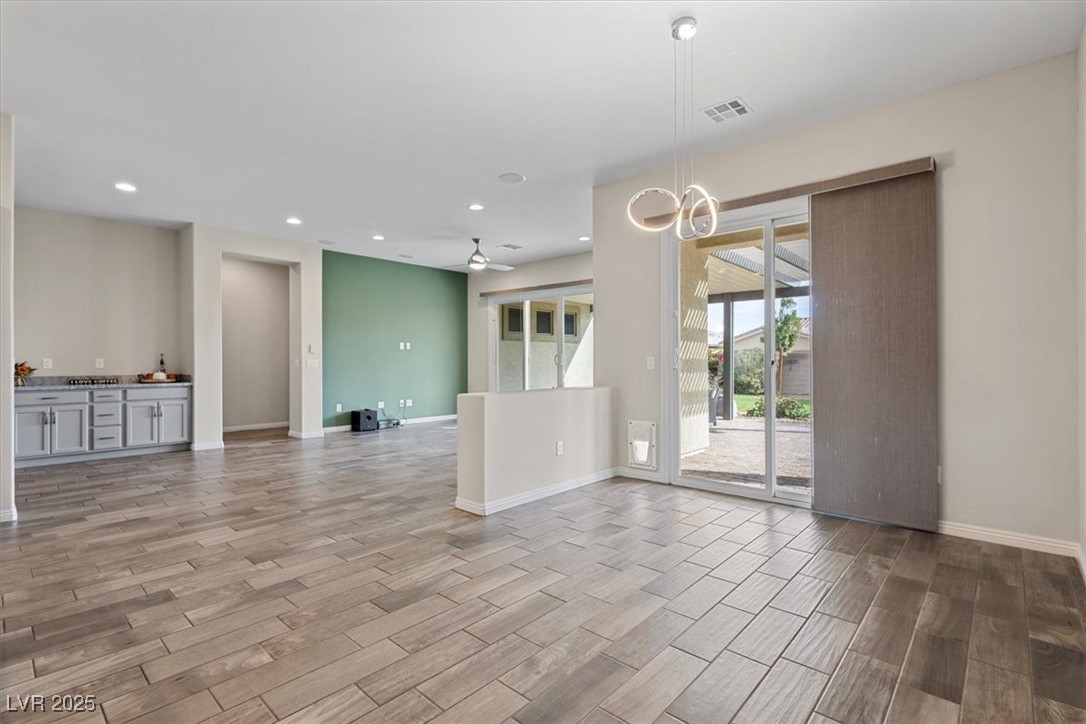7072 Arabian Ridge Street Las Vegas, NV 89131 - Photo 13 of 30 Dining room, living room and coffee bar area