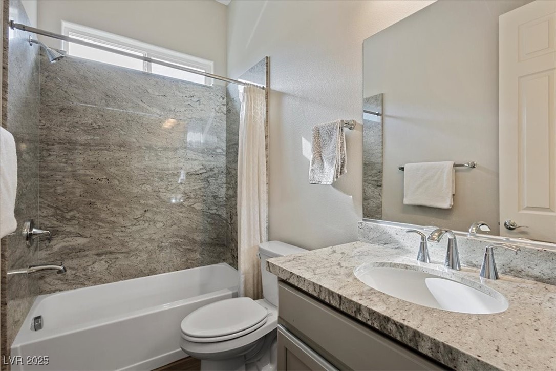 7072 Arabian Ridge Street Las Vegas, NV 89131 - Photo 23 of 30 Bath 2 off the kitchen and dining room