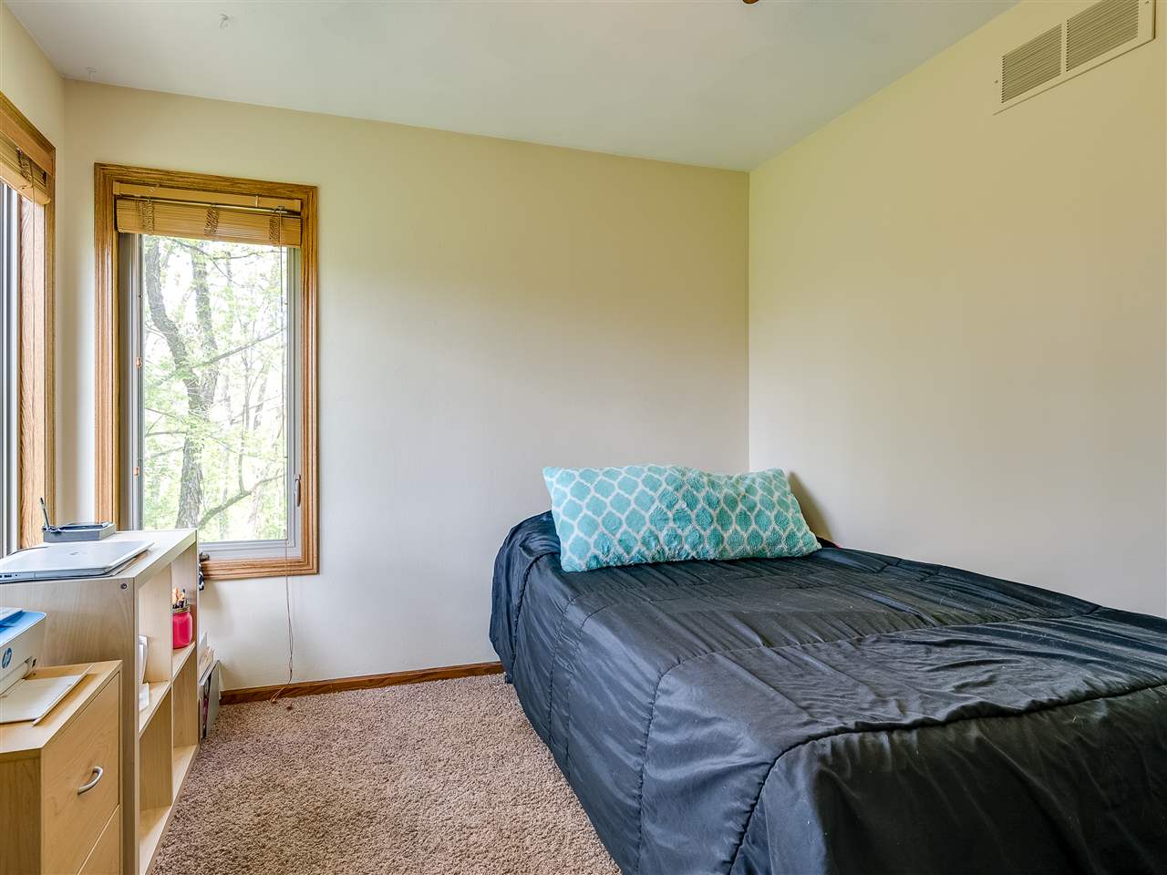 10201 North Campbell Road Durand, IL 61024 - Photo 19 of 20 a bedroom with a bed and wooden floor