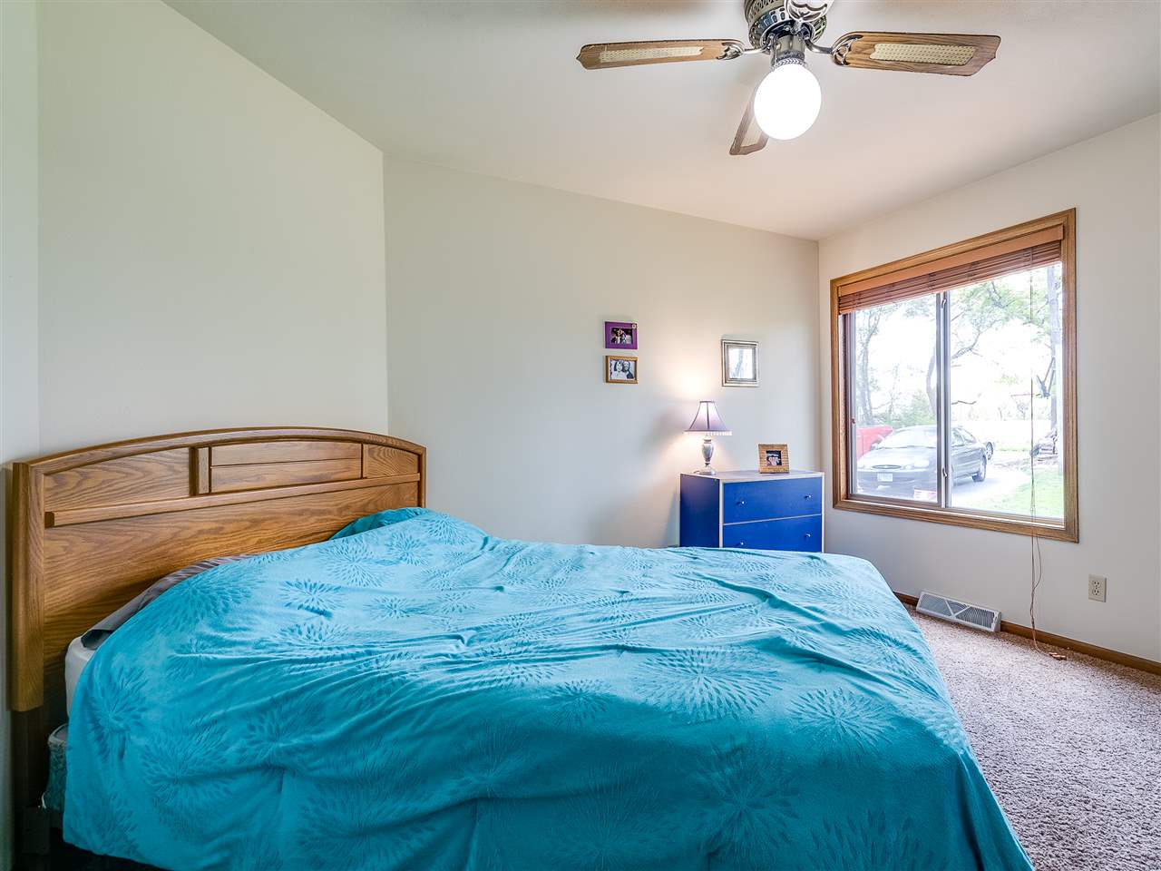 10201 North Campbell Road Durand, IL 61024 - Photo 20 of 20 a bedroom with a bed and window