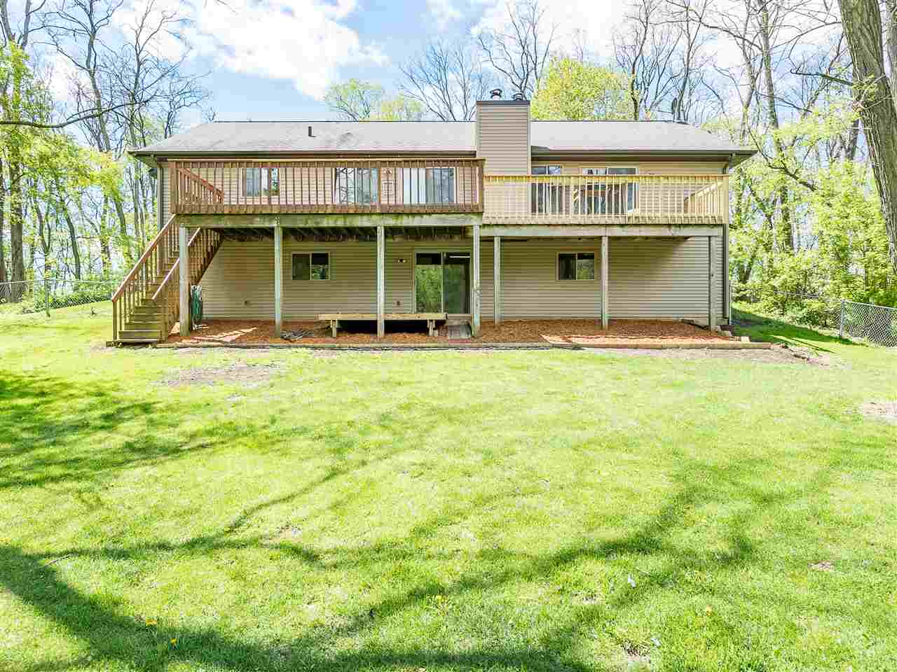 10201 North Campbell Road Durand, IL 61024 - Photo 10 of 20 a view of an house with backyard space and balcony