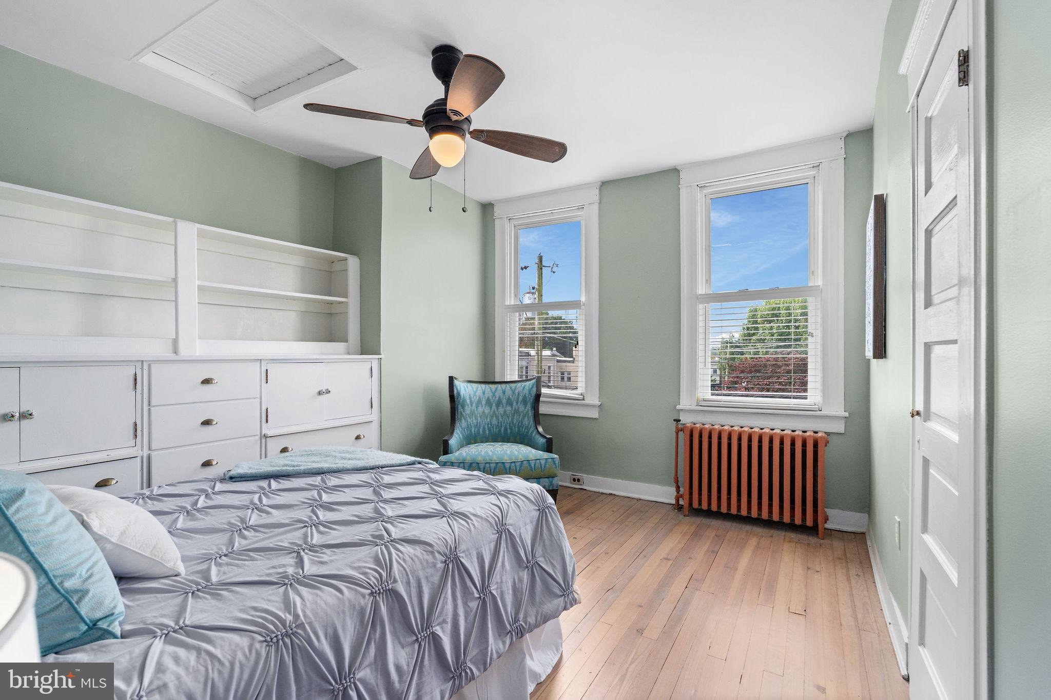 4148 Falls Road Baltimore, MD 21211 - Photo 24 of 37 a bedroom with a bed and a window