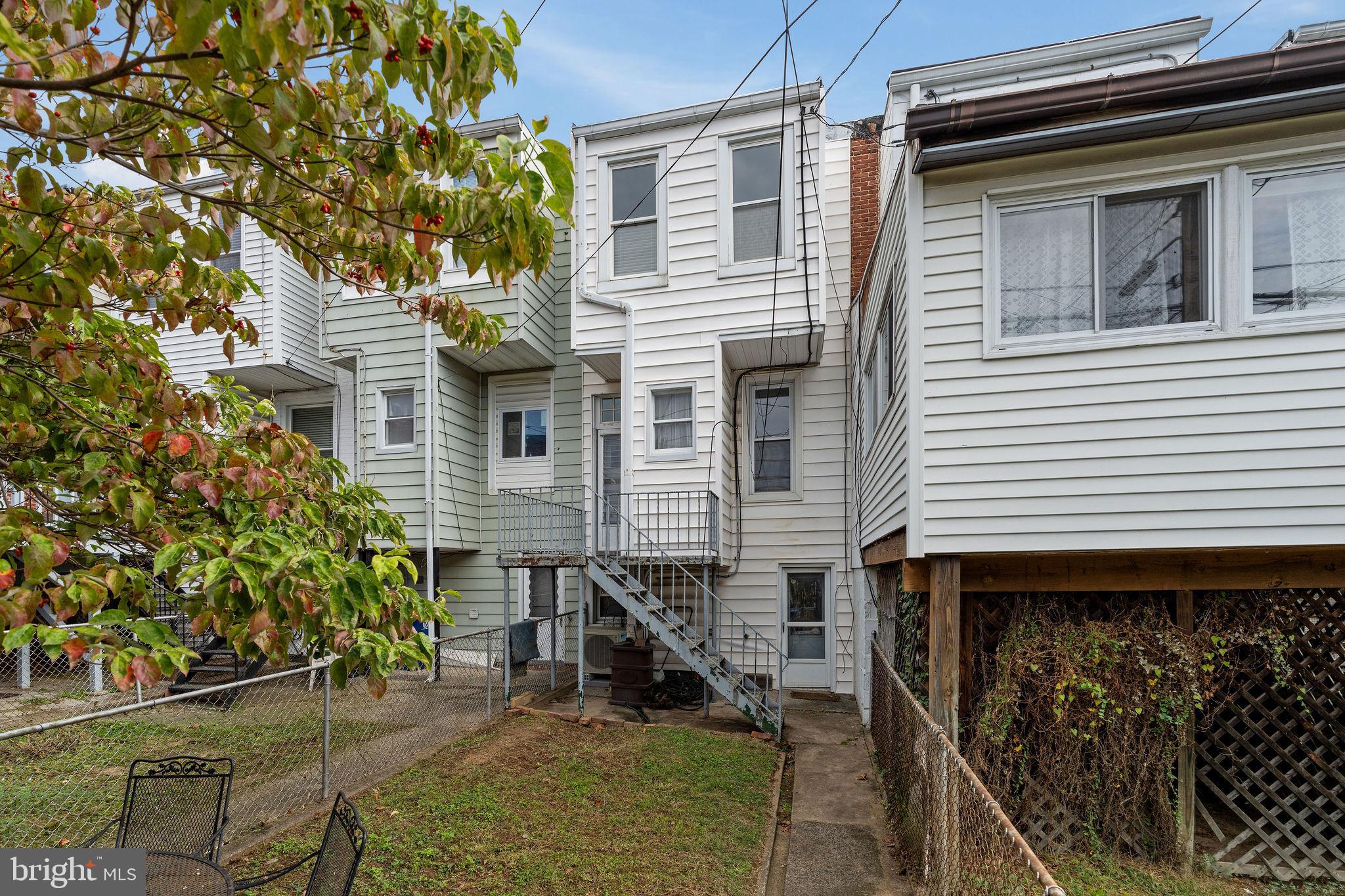 4148 Falls Road Baltimore, MD 21211 - Photo 34 of 37 a view of a house with a yard