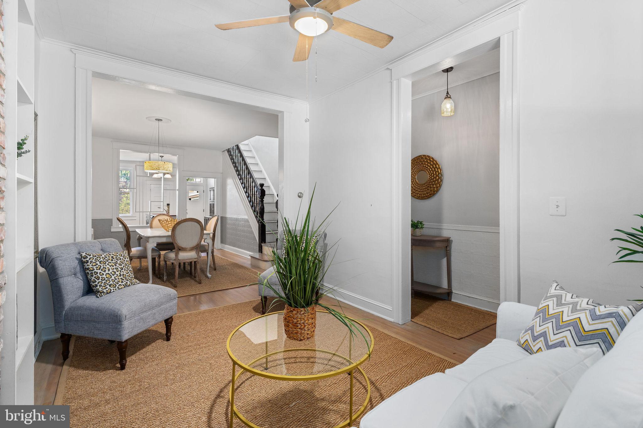 4148 Falls Road Baltimore, MD 21211 - Photo 8 of 37 a living room with furniture and wooden floor